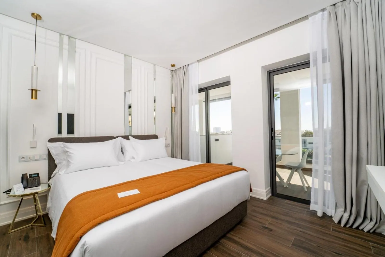 Bed in Petit Palace Suites Hotel