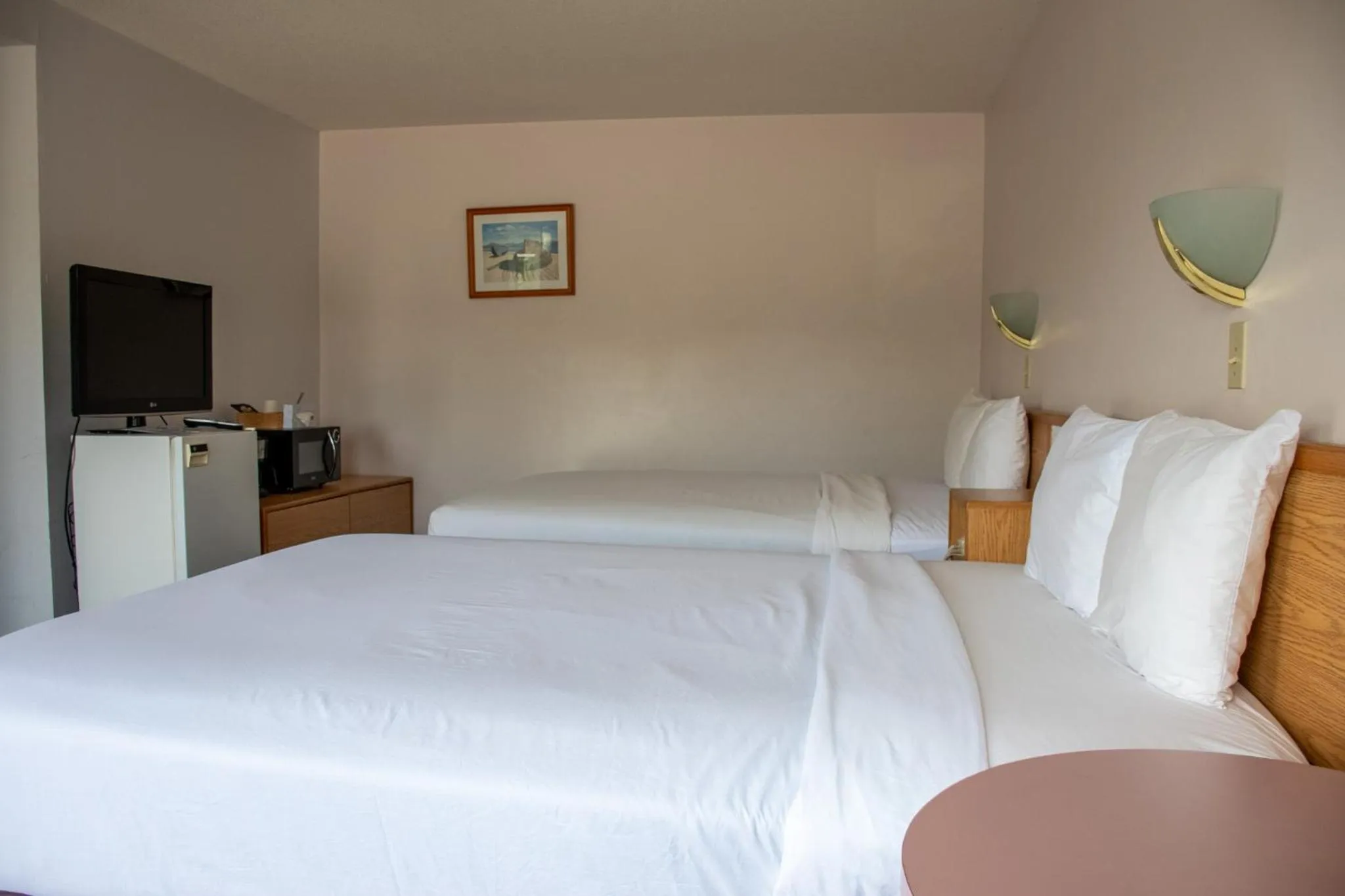 Bed in Ace Western Motel