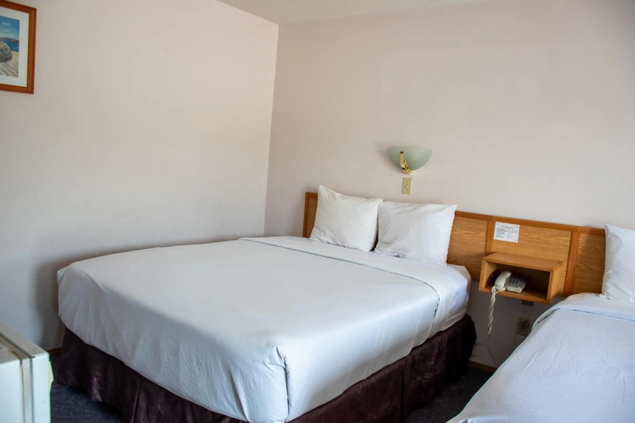 Bed in Ace Western Motel