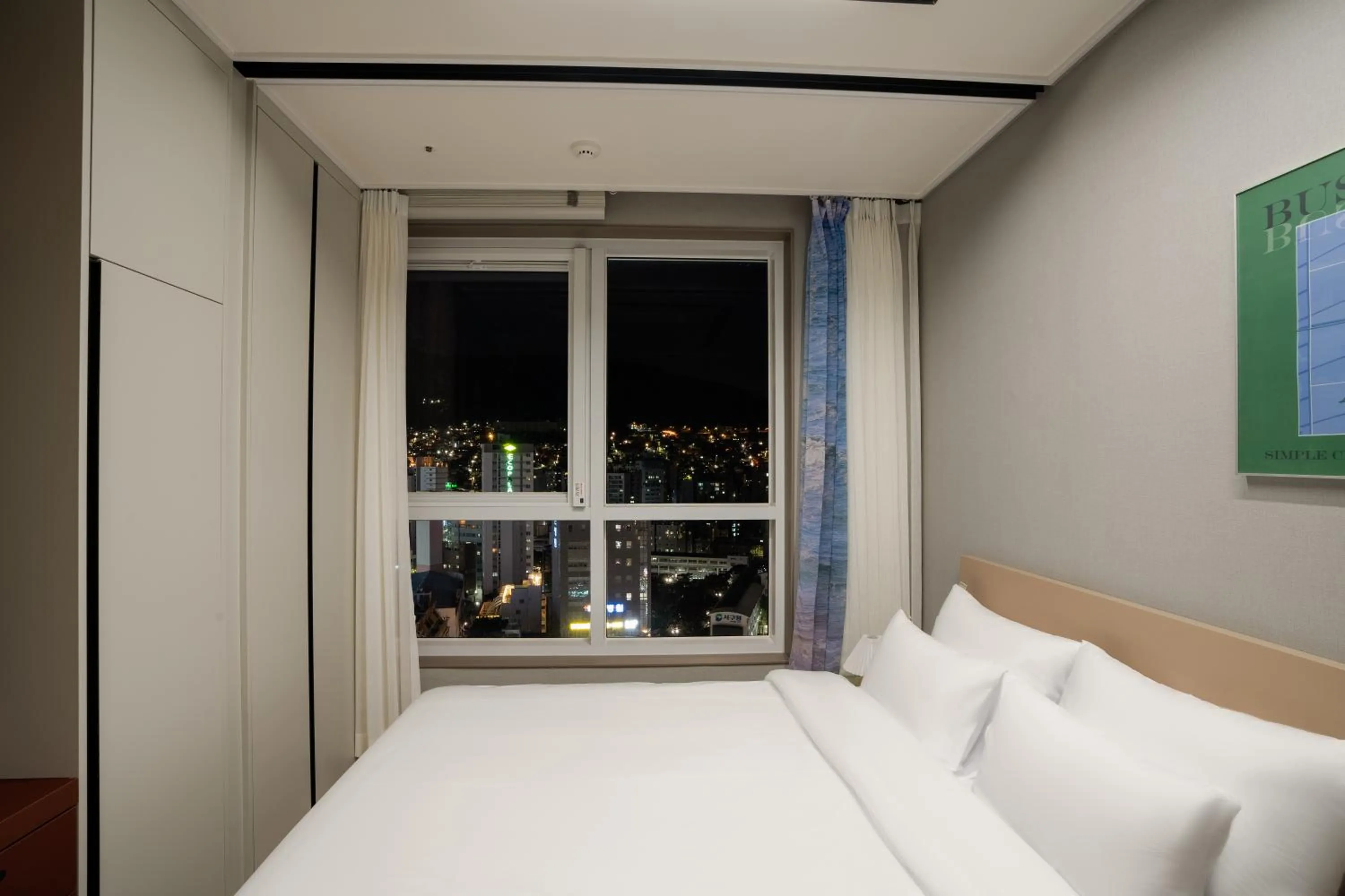 Bed in Radiant Nampo Hotel