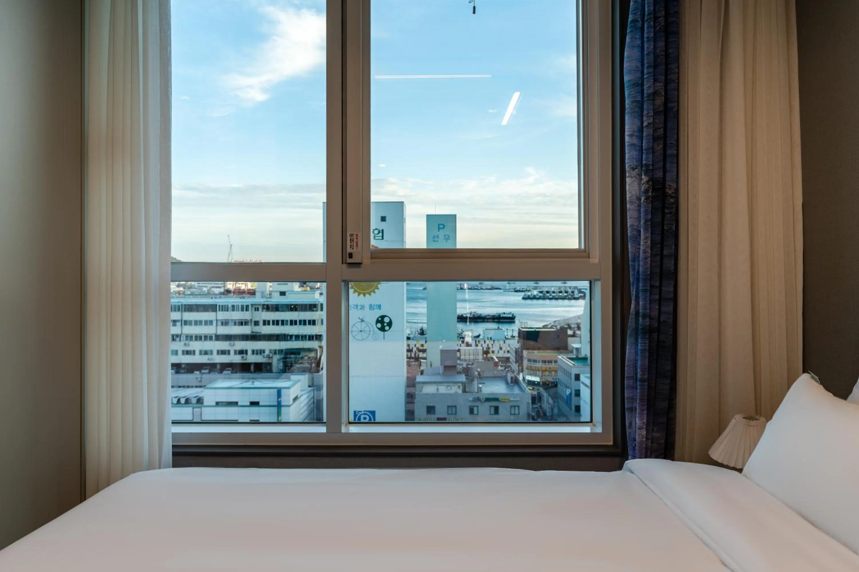 Photo of the whole room, Bed in Radiant Nampo Hotel