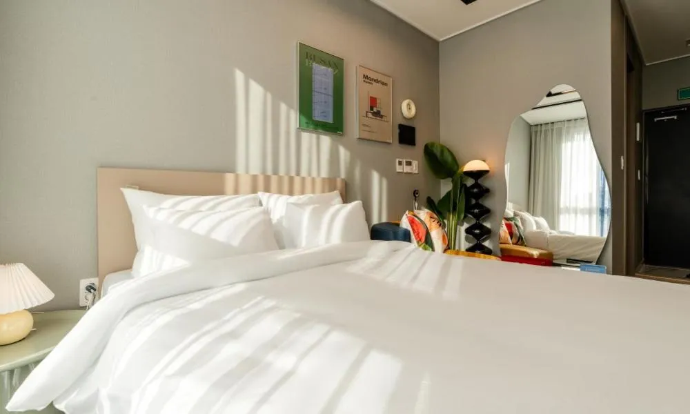 Bed in Radiant Nampo Hotel