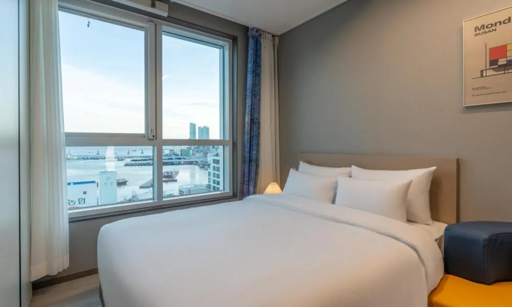 Bed in Radiant Nampo Hotel