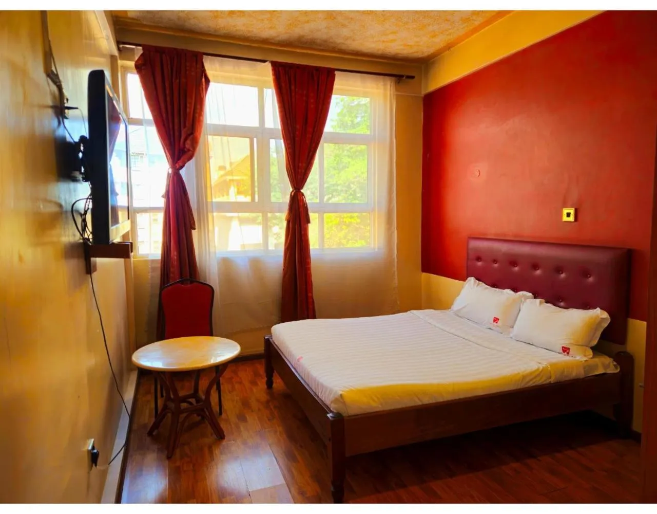 Bed in Pearl Palace Hotel