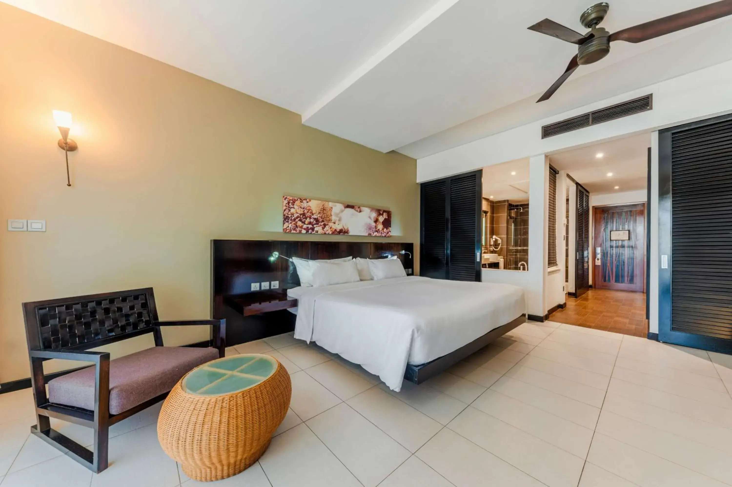 Bedroom, Bed in Crystals Beach Resort Belle Mare, a member of Radisson Individuals Bedroom, Bed in Crystals Beach Resort Belle Mare, a member of Radisson Individuals