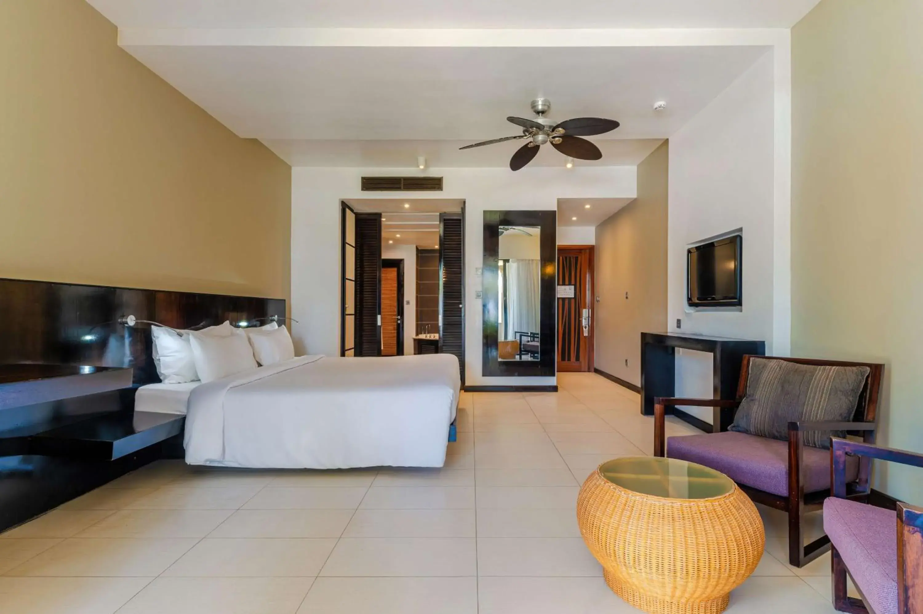 Bedroom, Bed in Crystals Beach Resort Belle Mare, a member of Radisson Individuals Bedroom, Bed in Crystals Beach Resort Belle Mare, a member of Radisson Individuals