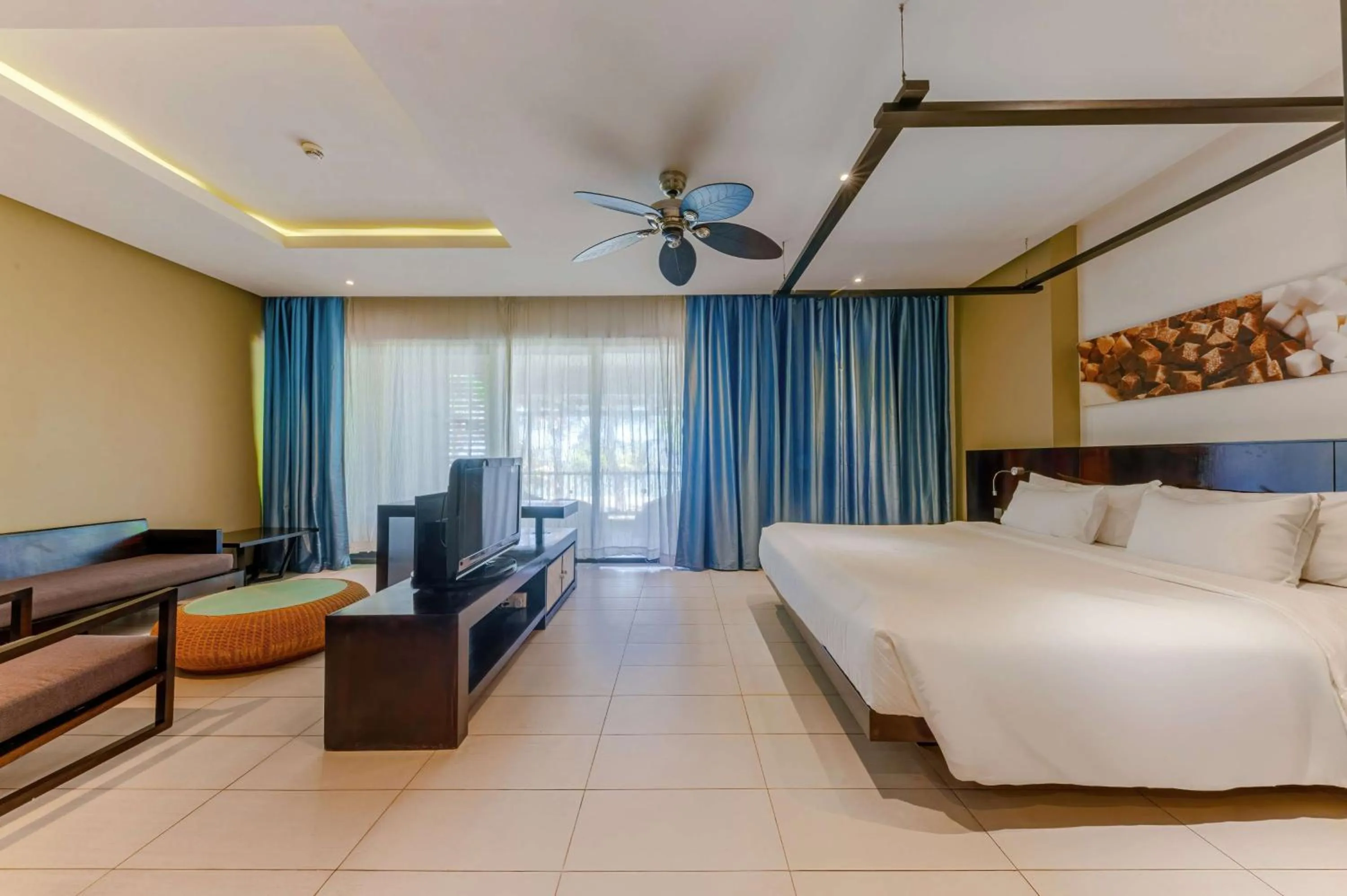 Photo of the whole room, Bed in Crystals Beach Resort Belle Mare, a member of Radisson Individuals