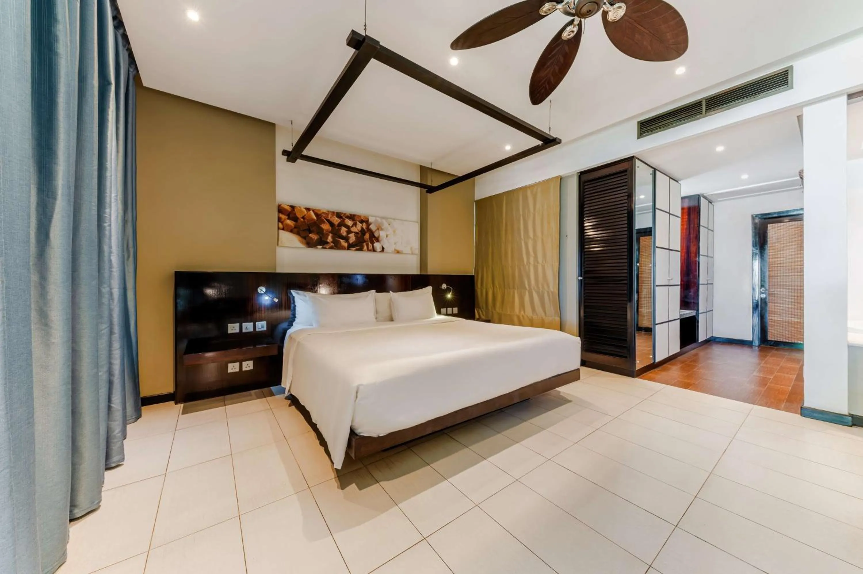 Photo of the whole room, Bed in Crystals Beach Resort Belle Mare, a member of Radisson Individuals