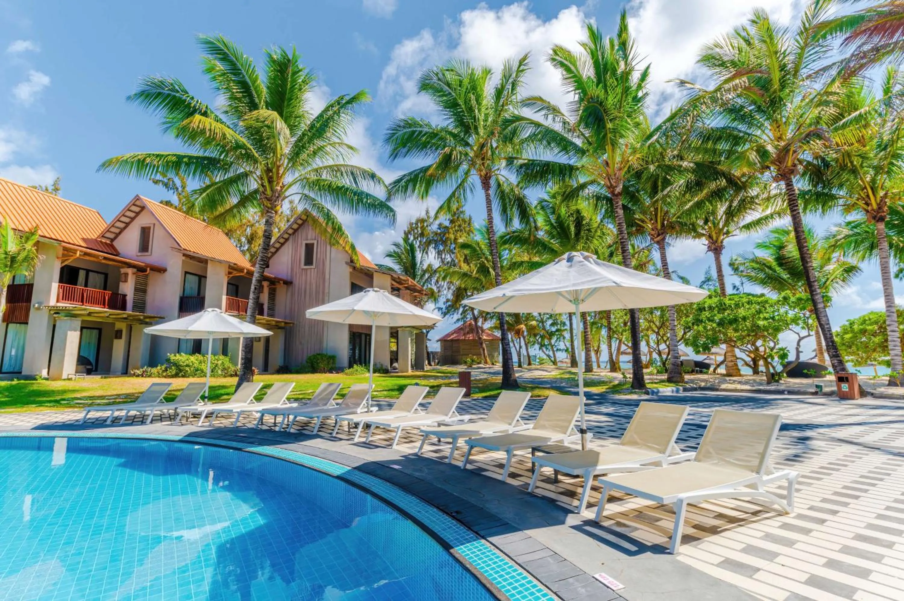 Pool view in Crystals Beach Resort Belle Mare, a member of Radisson Individuals