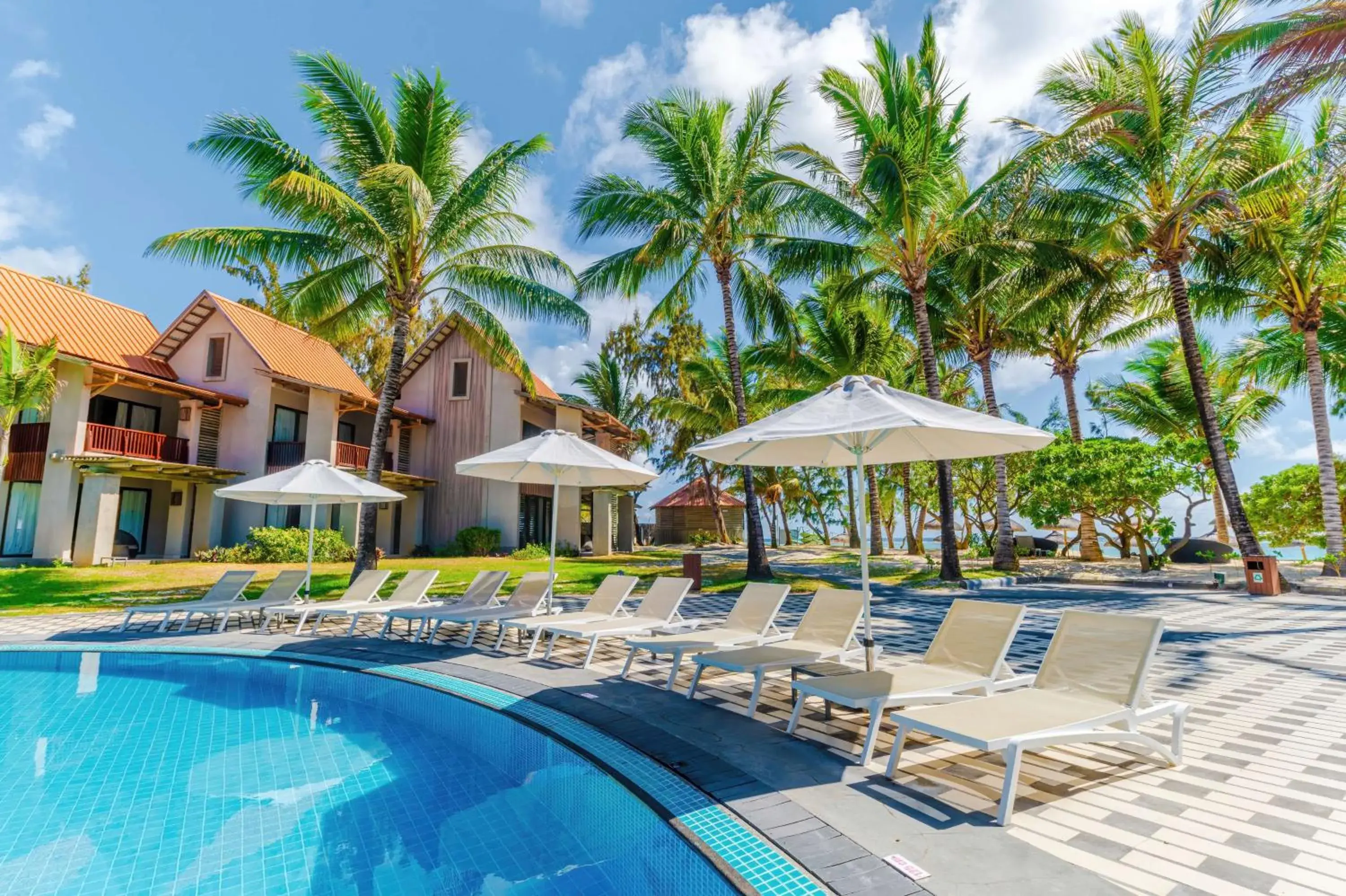 Pool view in Crystals Beach Resort Belle Mare, a member of Radisson Individuals Pool view in Crystals Beach Resort Belle Mare, a member of Radisson Individuals