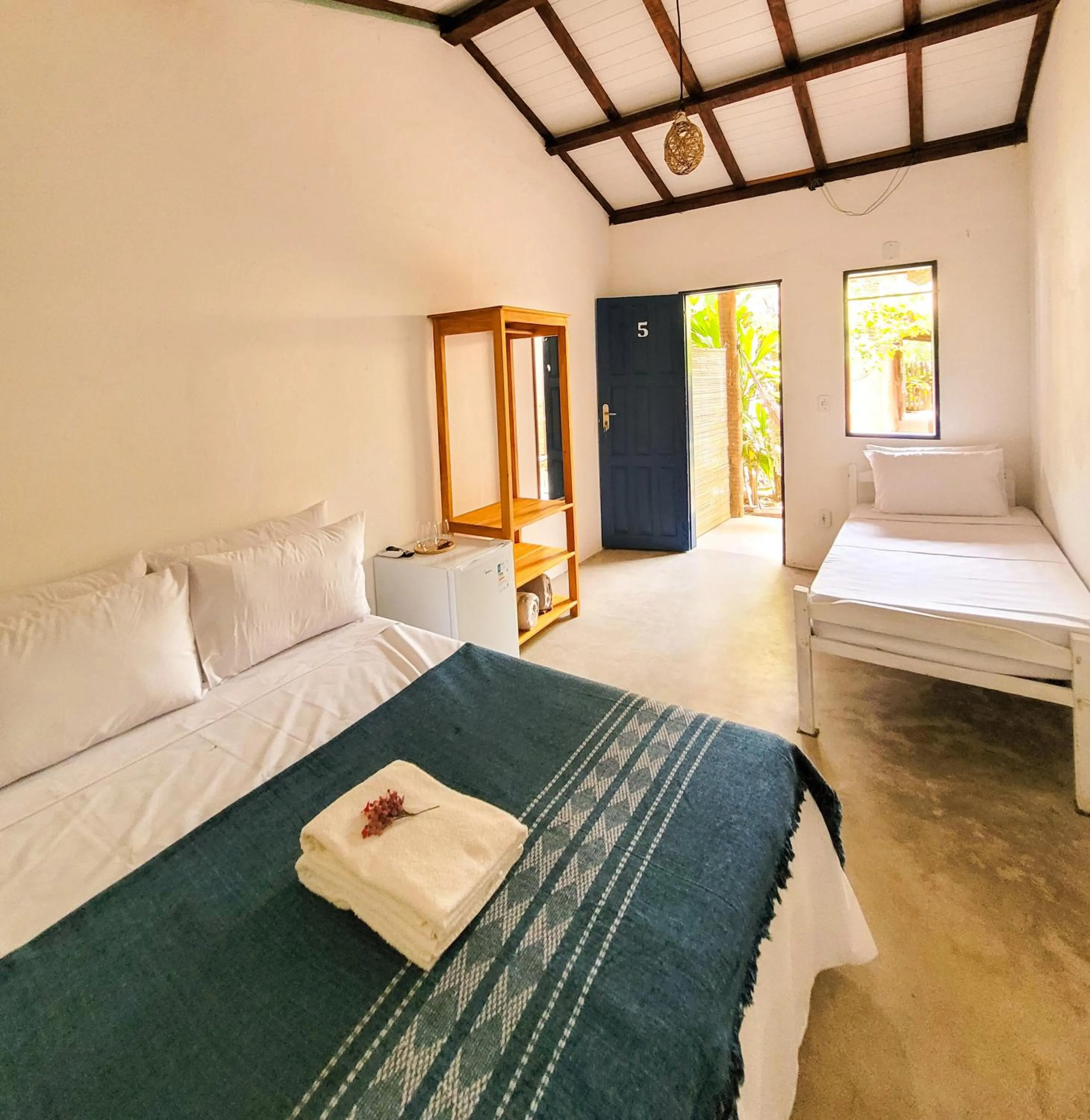 Bed in Pousada Vilarejo