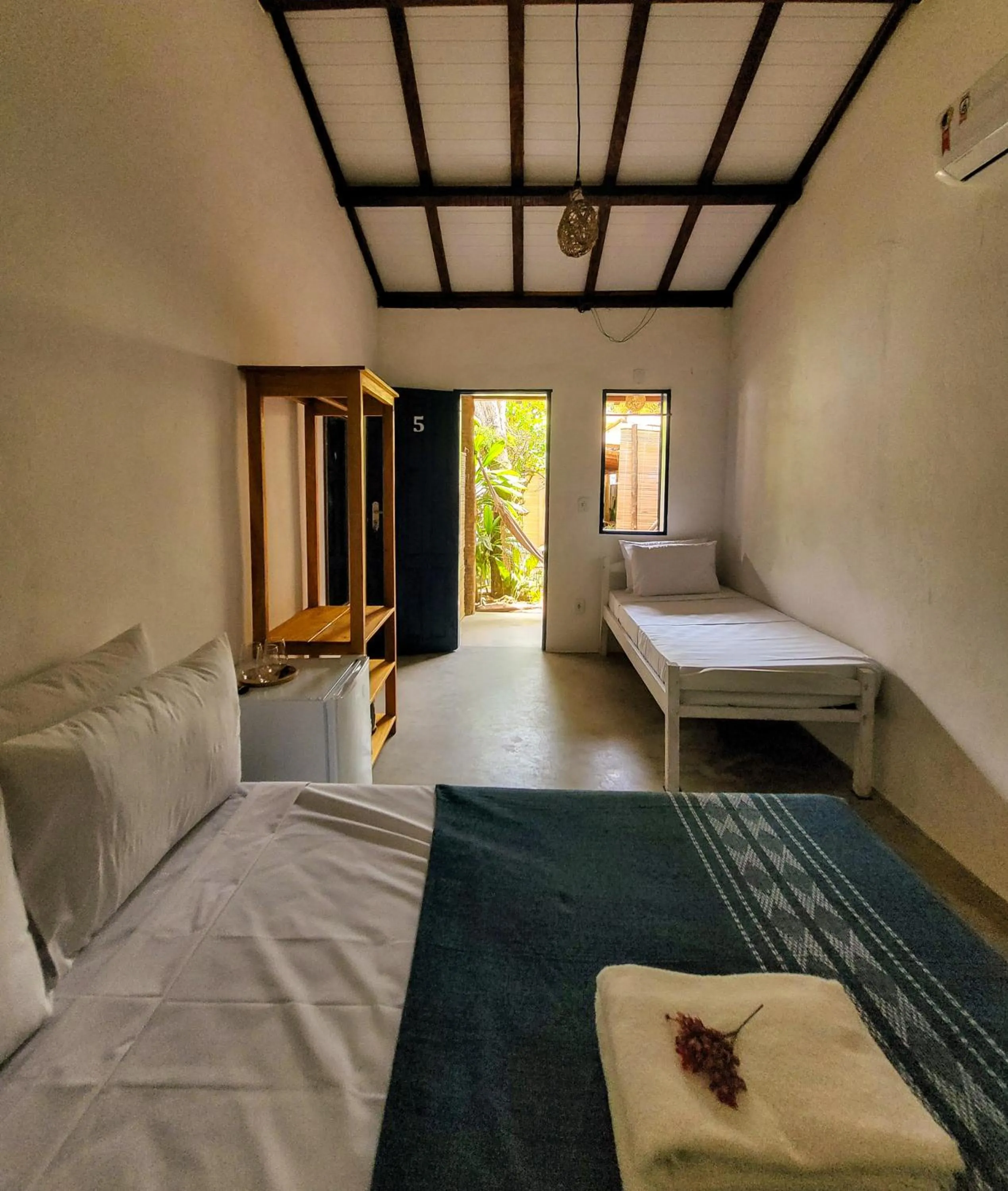 Bed in Pousada Vilarejo