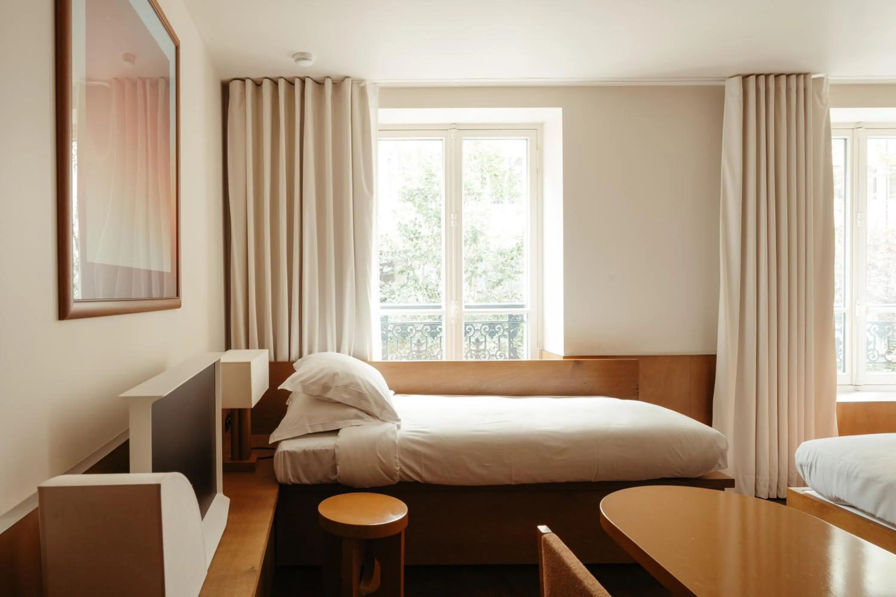 Bed in Edgar Suites - Bouchardon