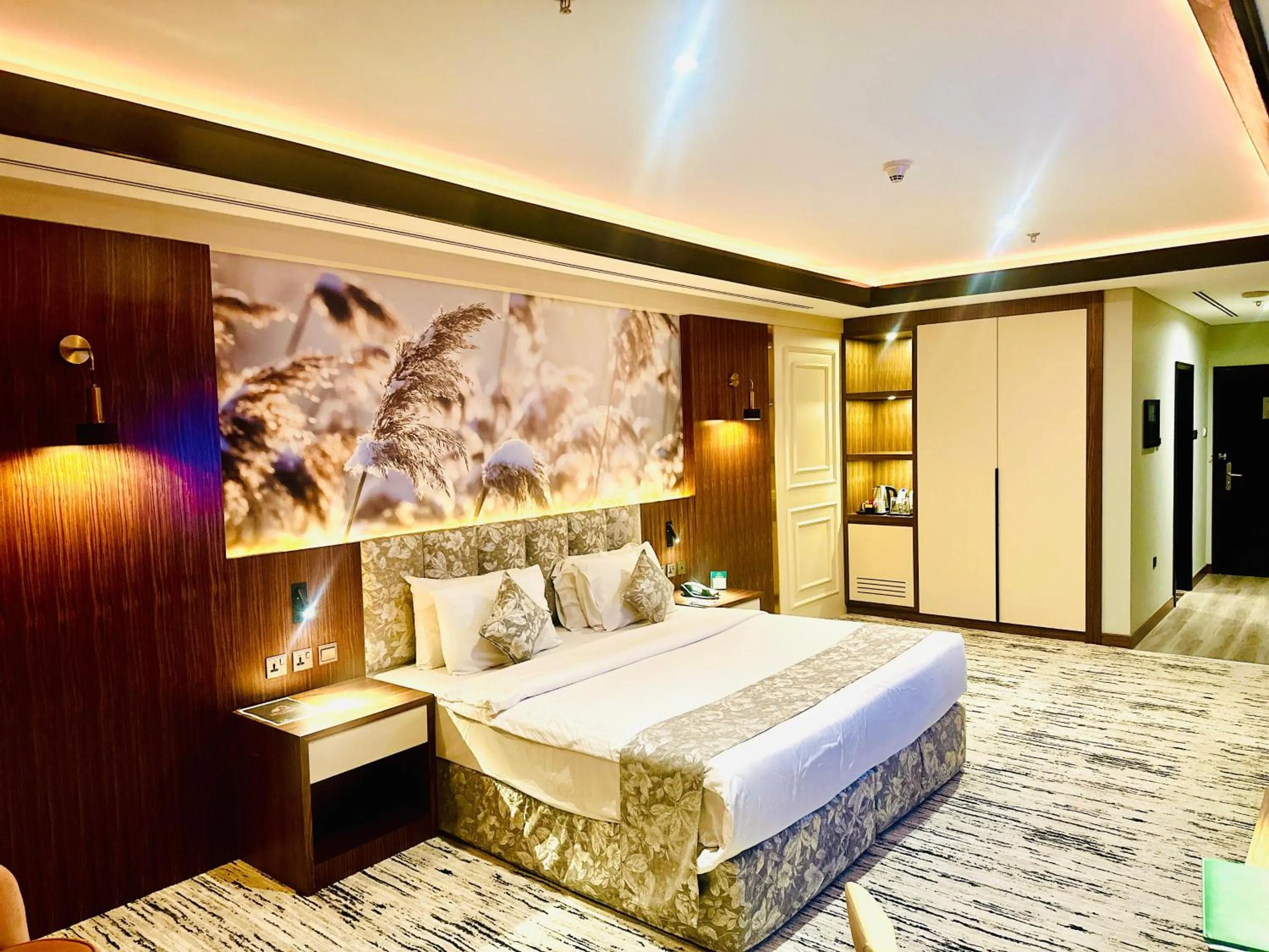 Bed in Raintree Rolla Hotel