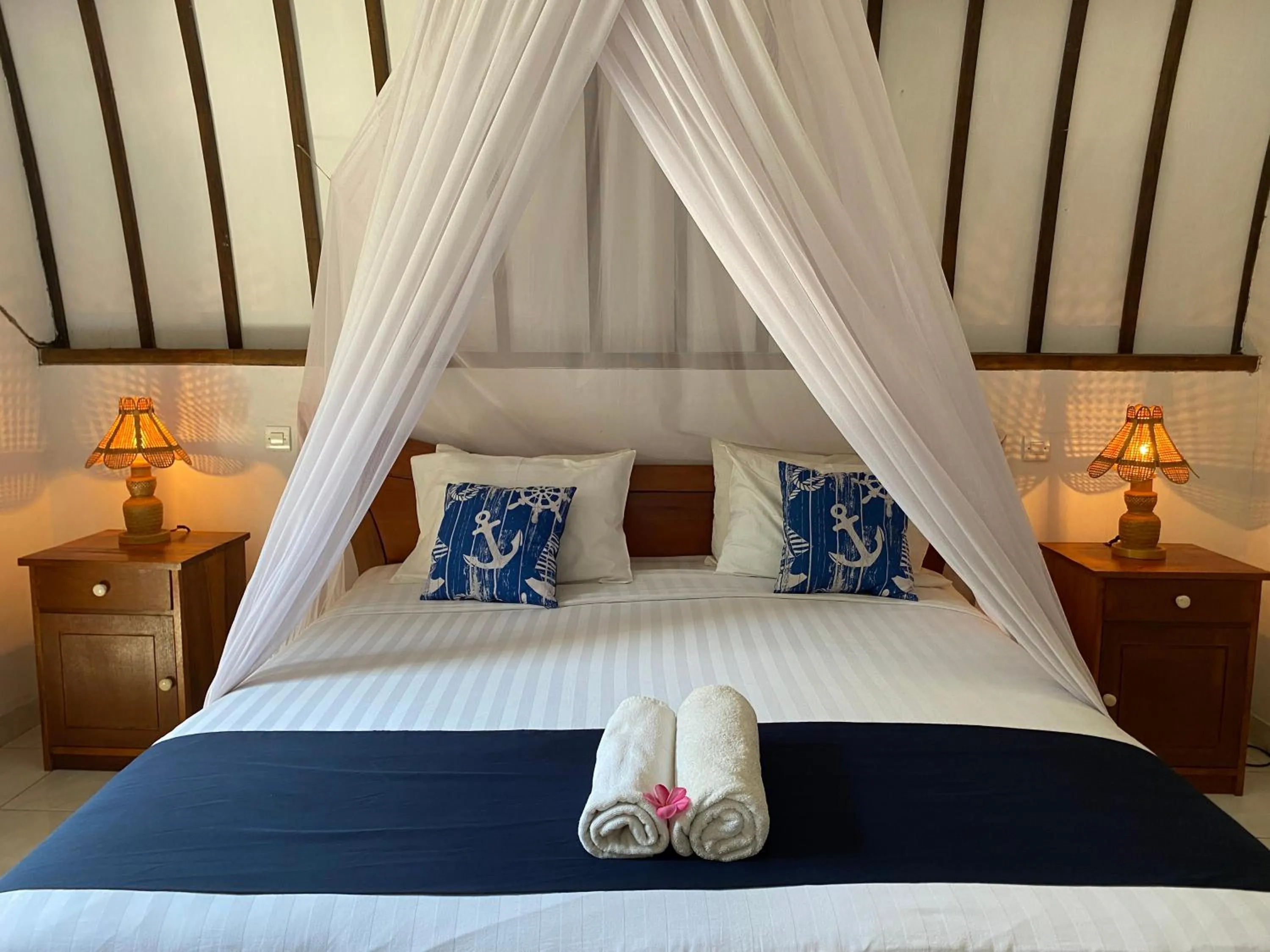 Bed in Mustika Ocean Lodge