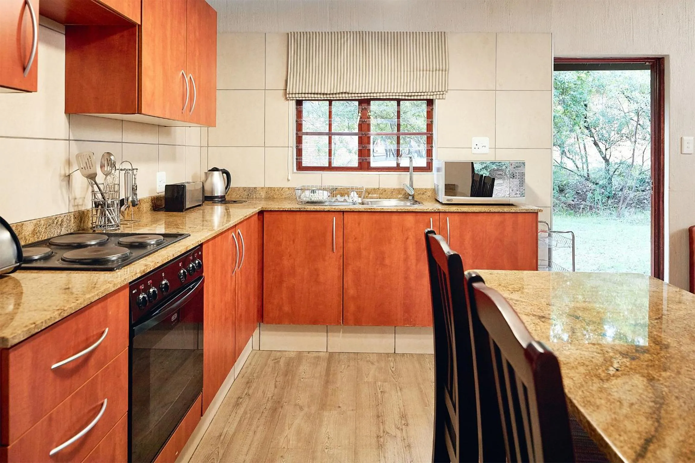 Kitchen or kitchenette in First Group Magalies Park