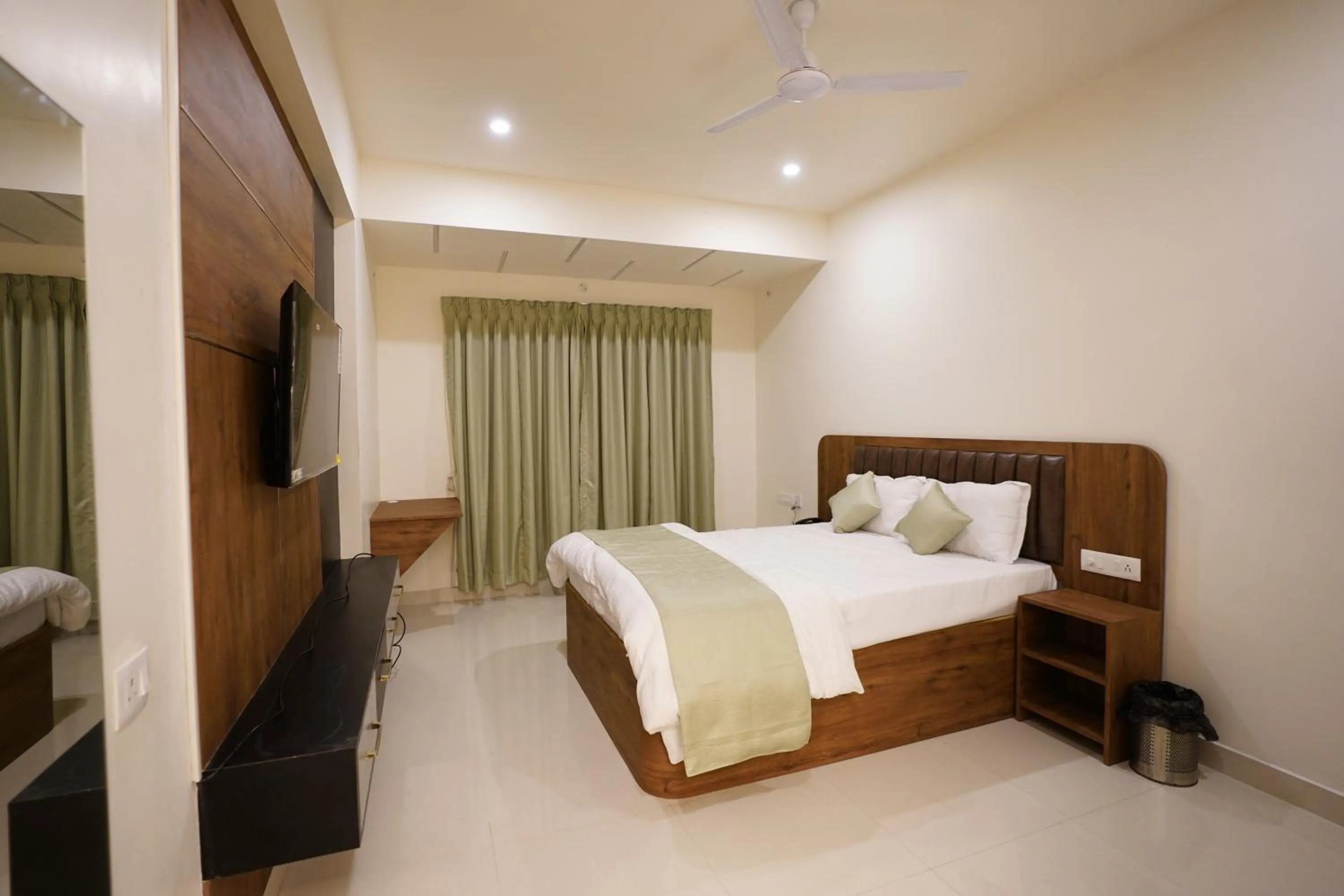 Bed in DrizzleDrop Inn Chennai