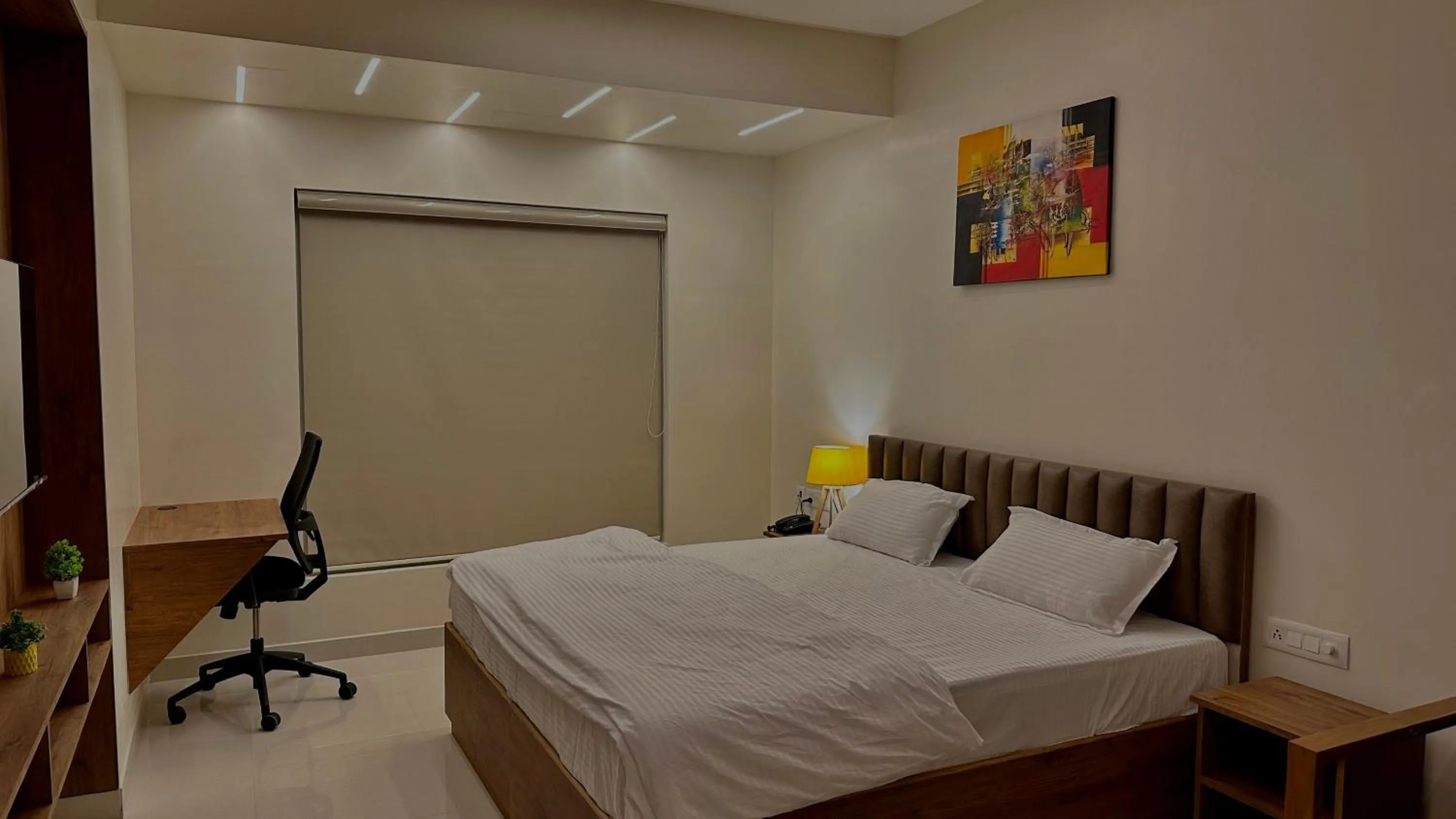 Bed in DrizzleDrop Inn Chennai