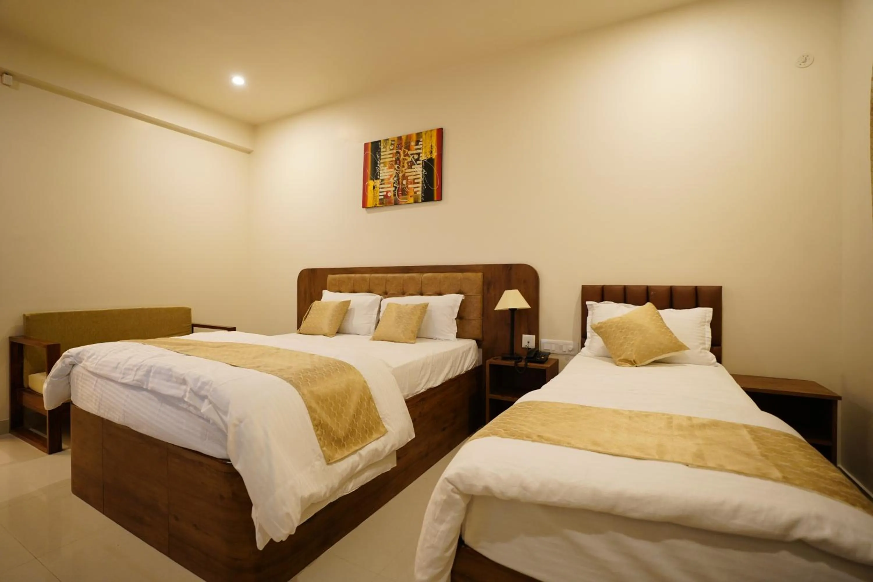 Bed in DrizzleDrop Inn Chennai