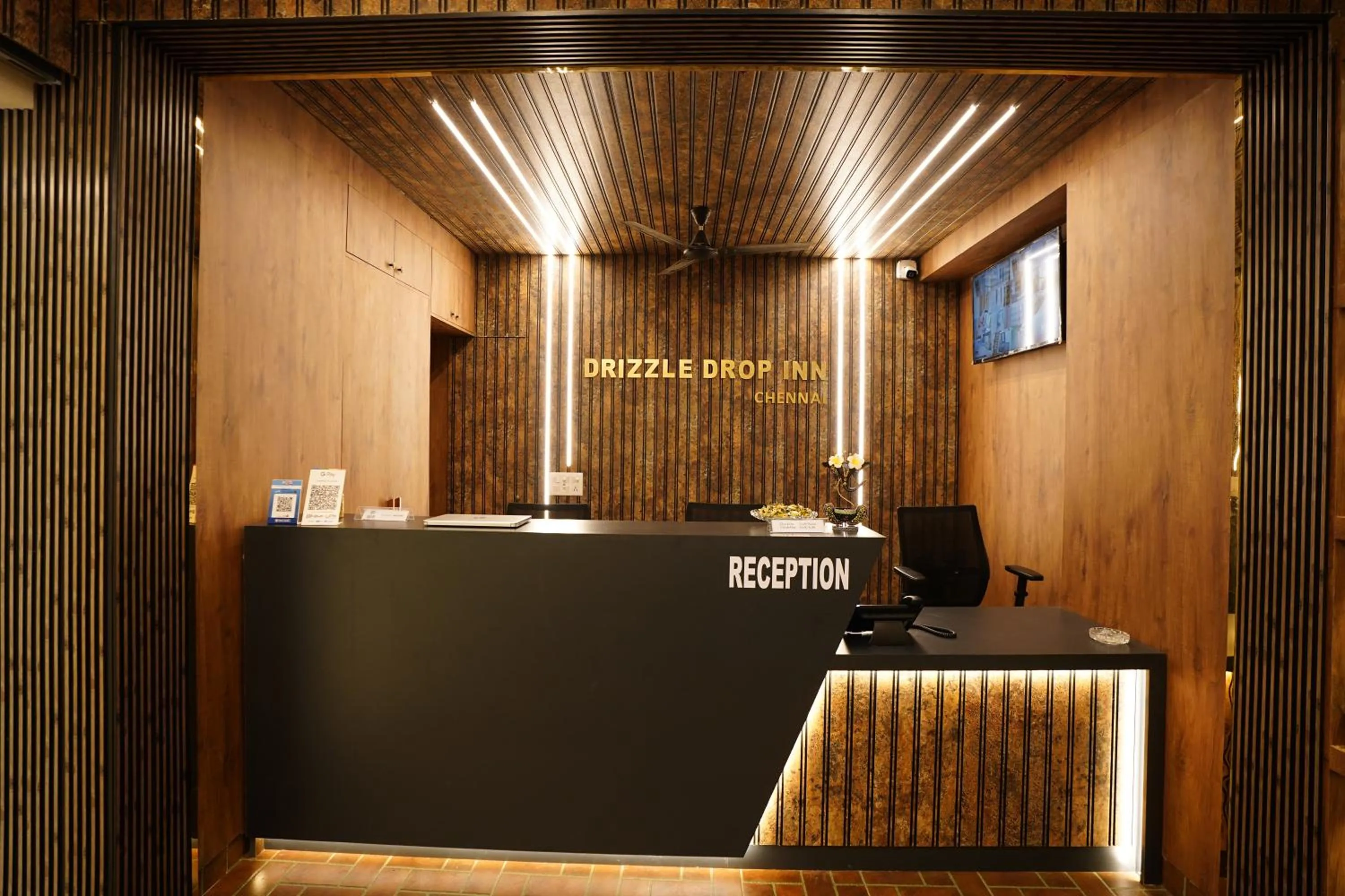 Property logo or sign in DrizzleDrop Inn Chennai