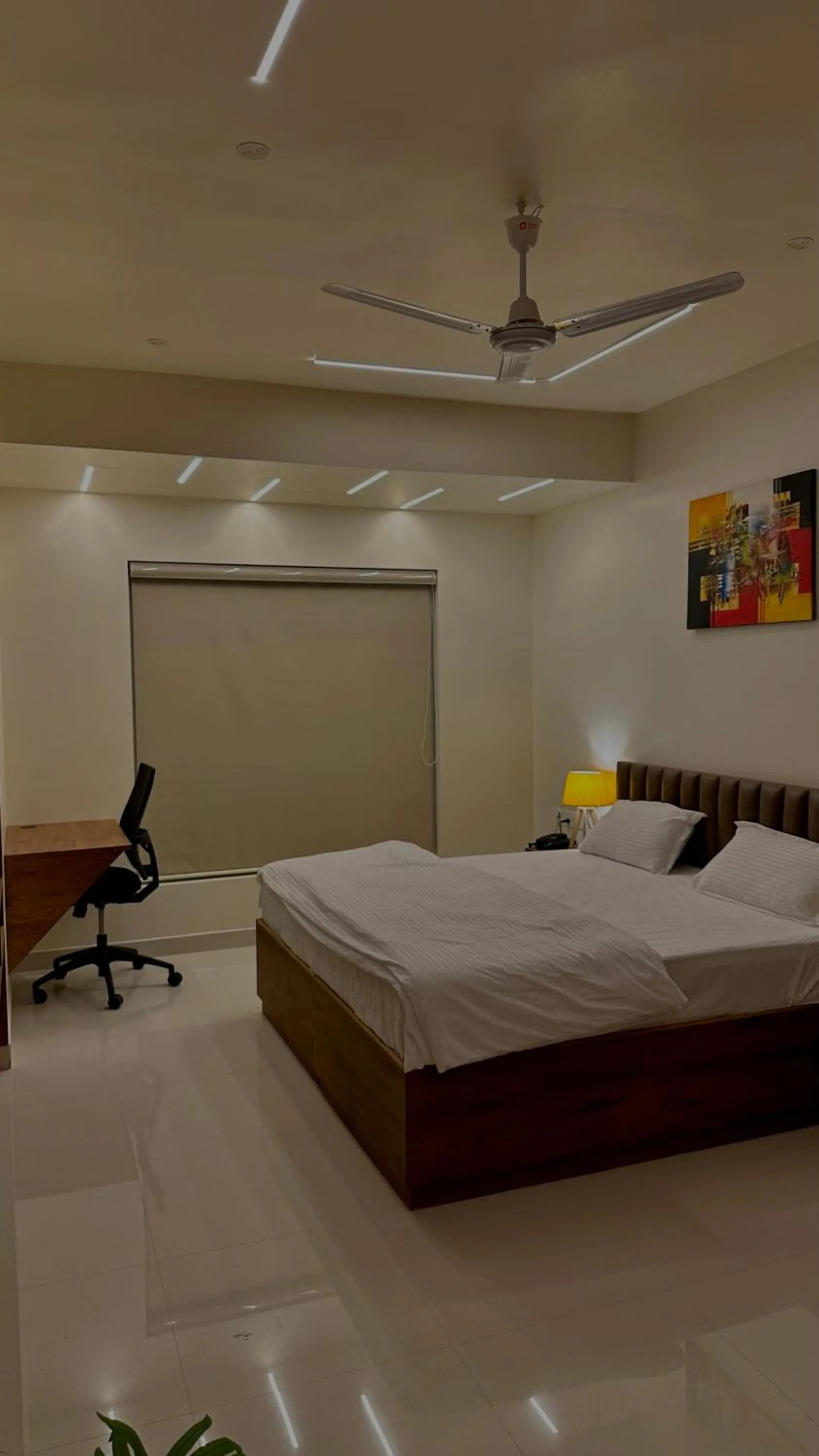 Bed in DrizzleDrop Inn Chennai