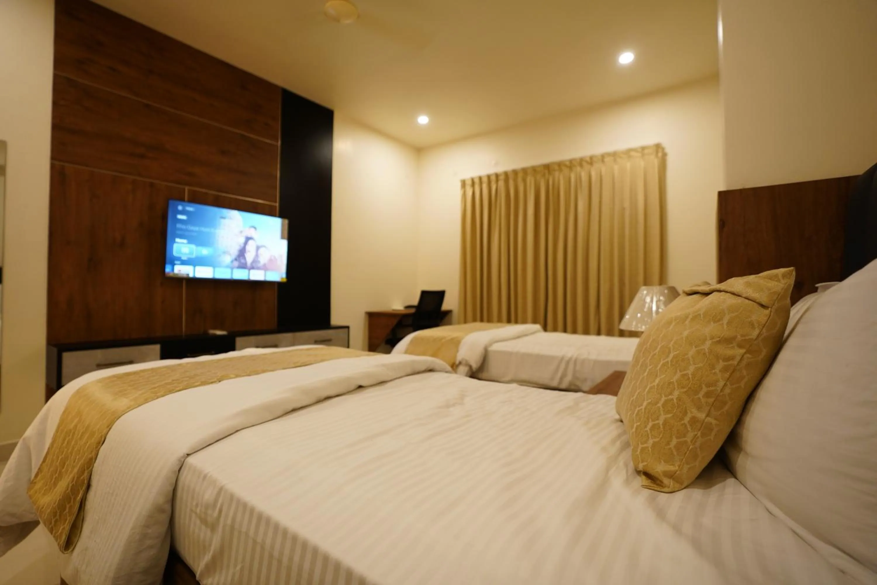 Bed in DrizzleDrop Inn Chennai