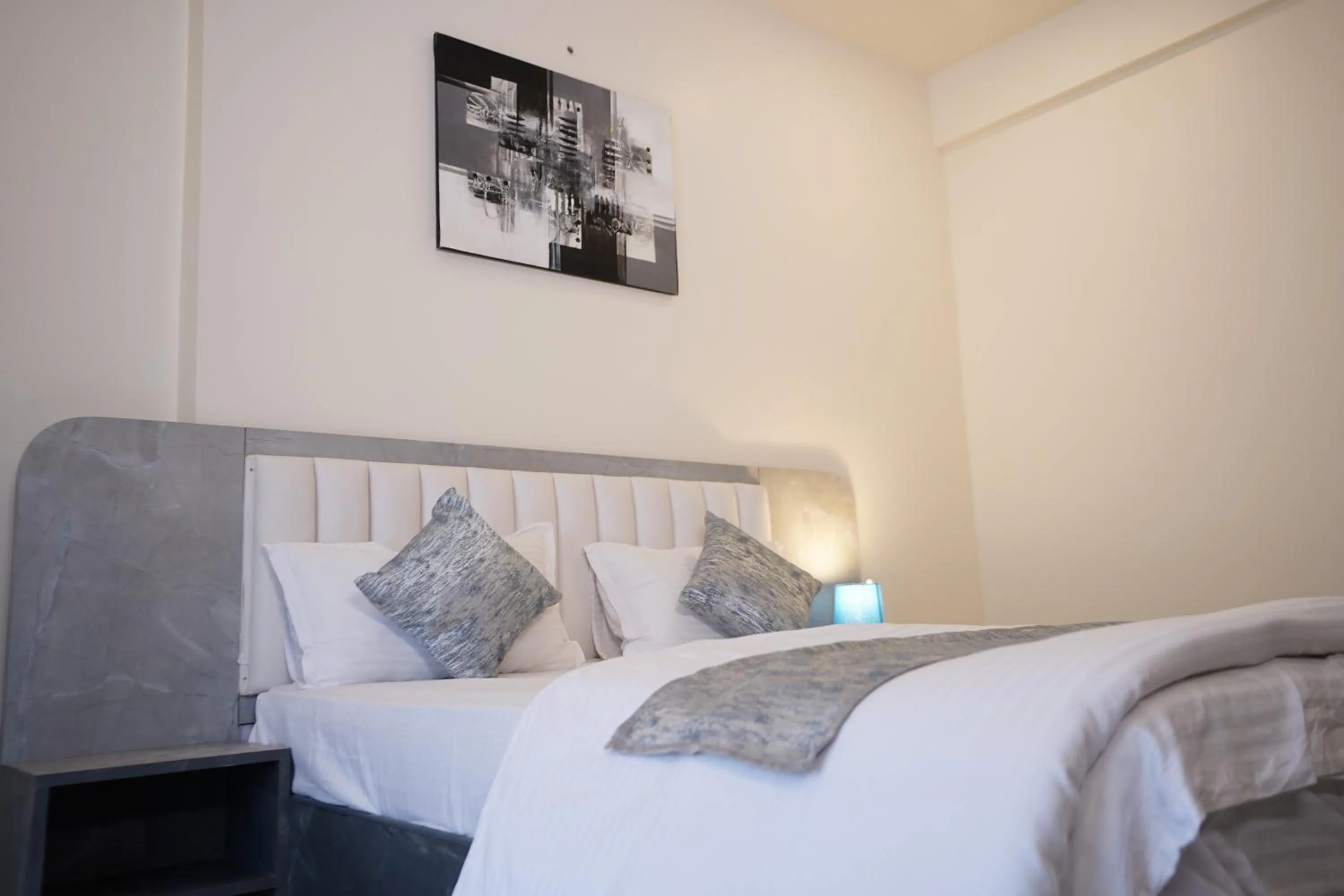 Bed in DrizzleDrop Inn Chennai