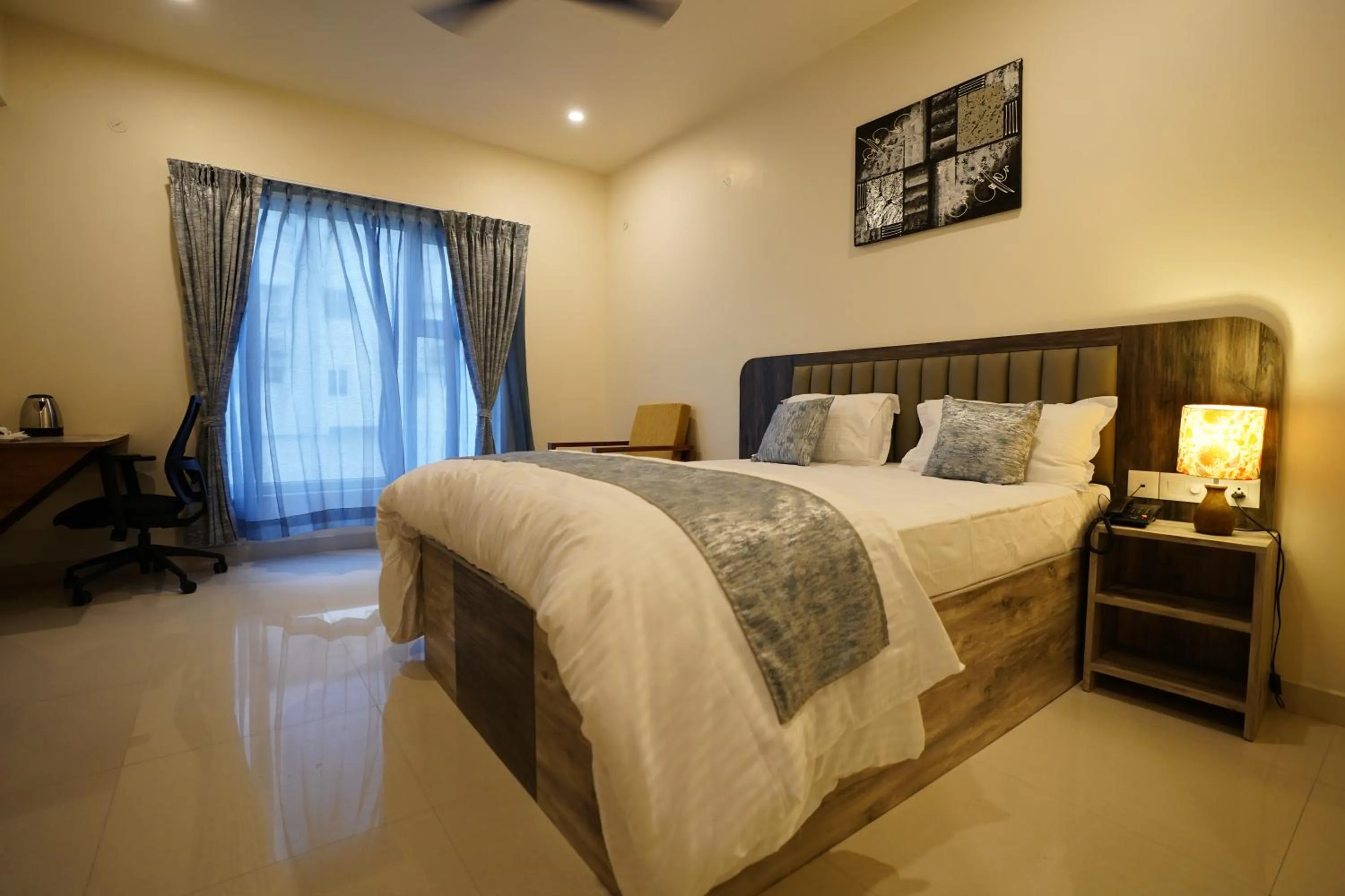 Bed in DrizzleDrop Inn Chennai