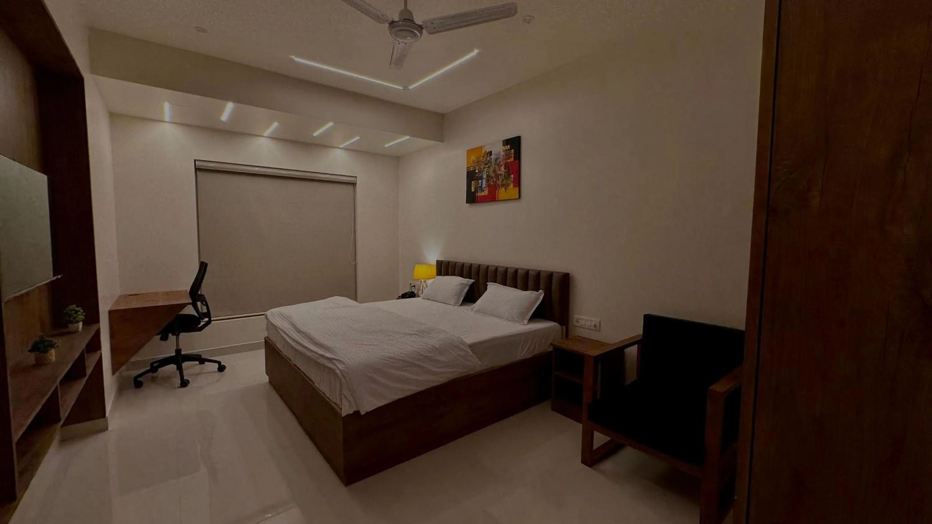 Bed in DrizzleDrop Inn Chennai