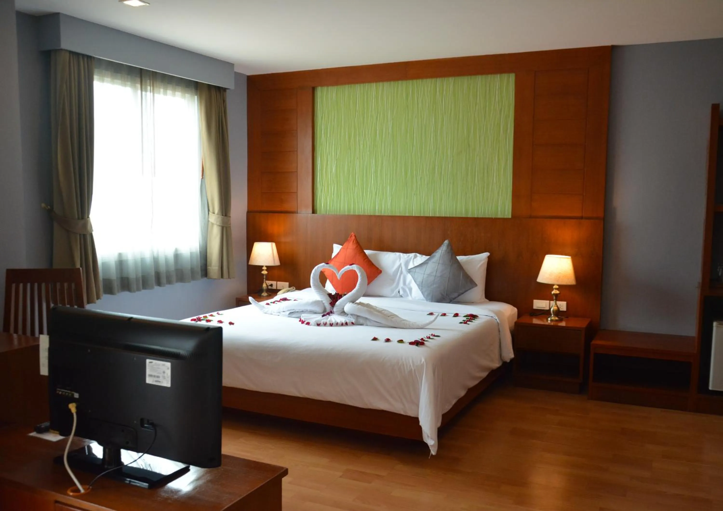 Bed in Elite Suites Patong