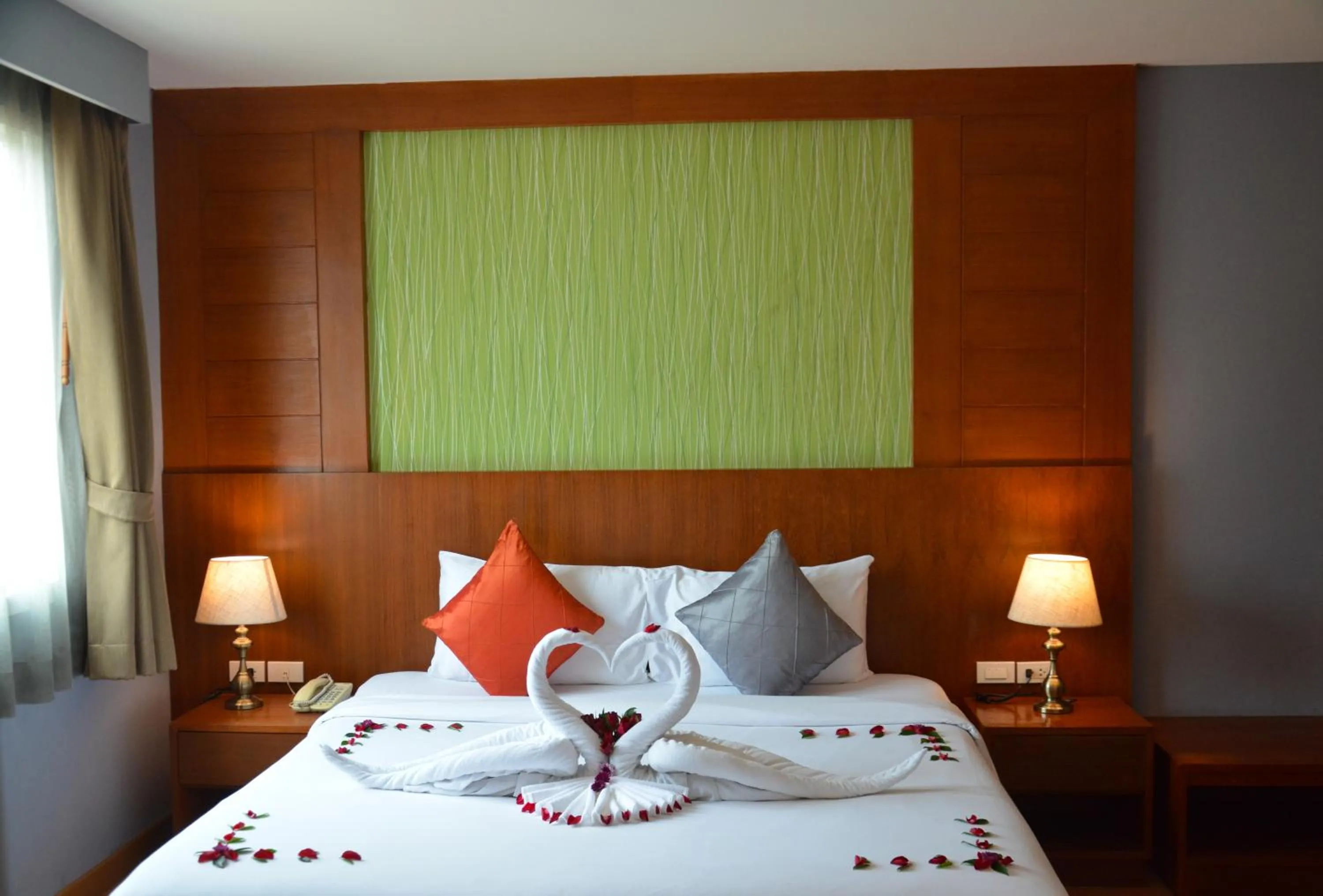 Bed in Elite Suites Patong