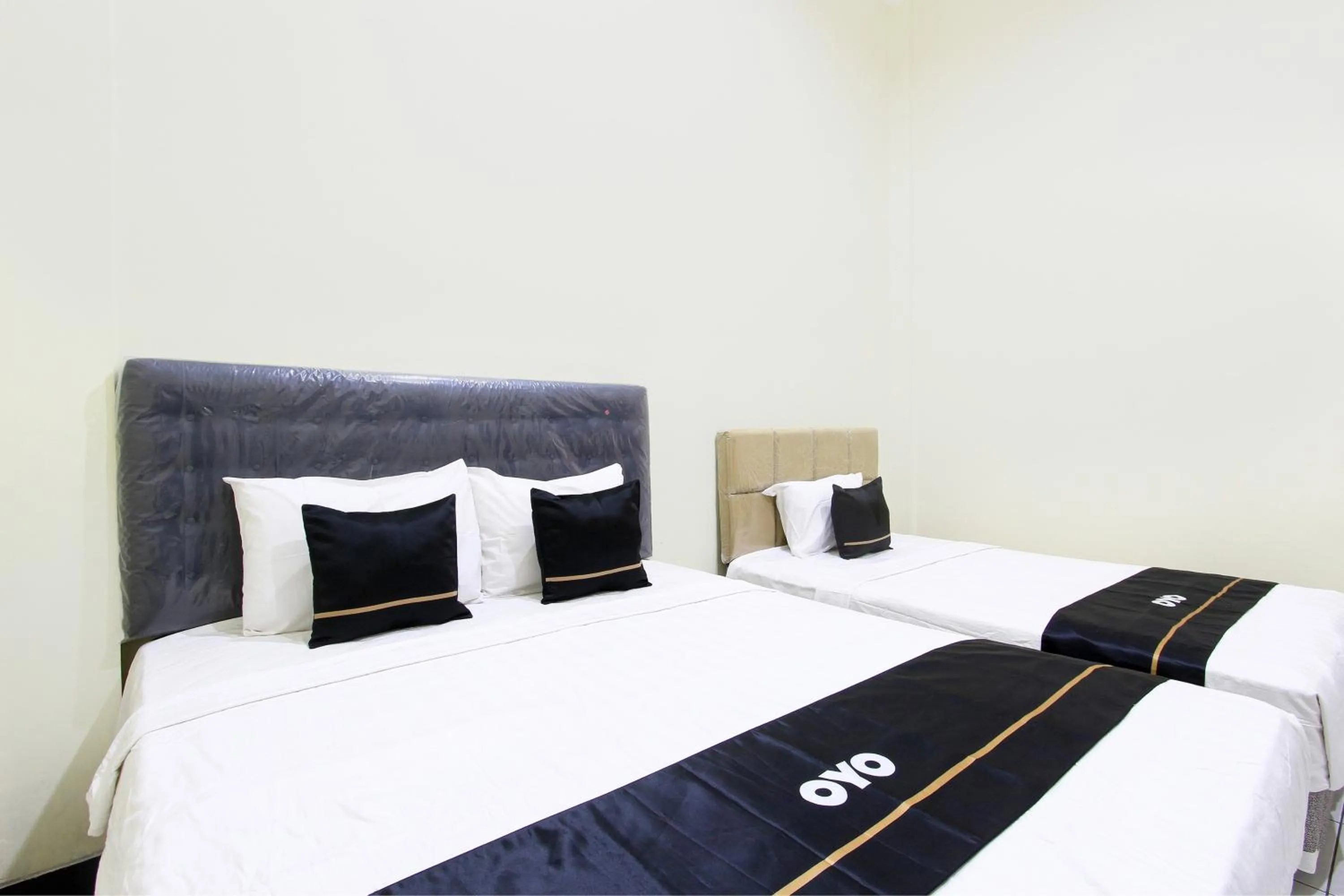 Bedroom in Super OYO Capital O 93204 Hotel Mulia Dua Syariah