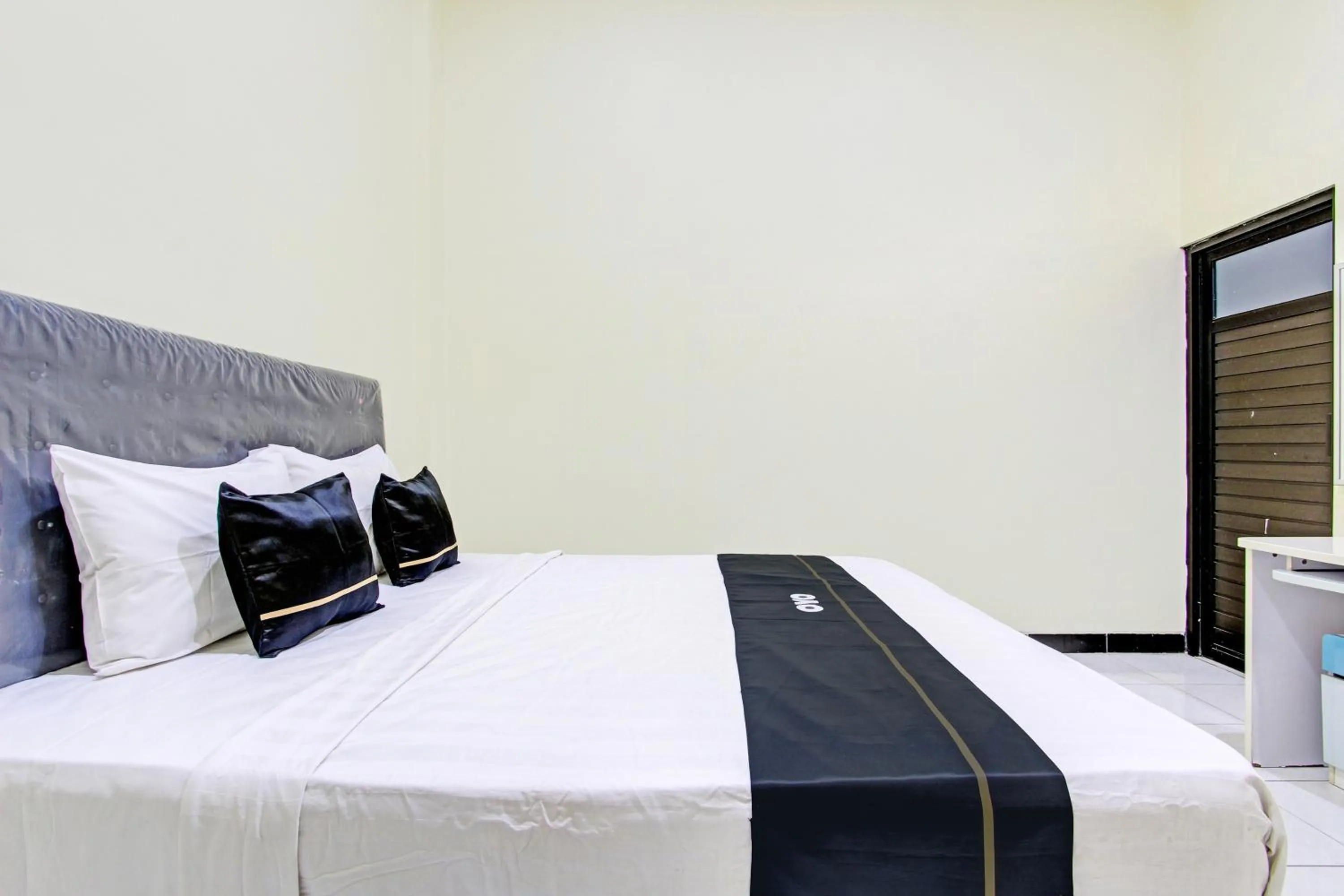 Bedroom in Super OYO Capital O 93204 Hotel Mulia Dua Syariah