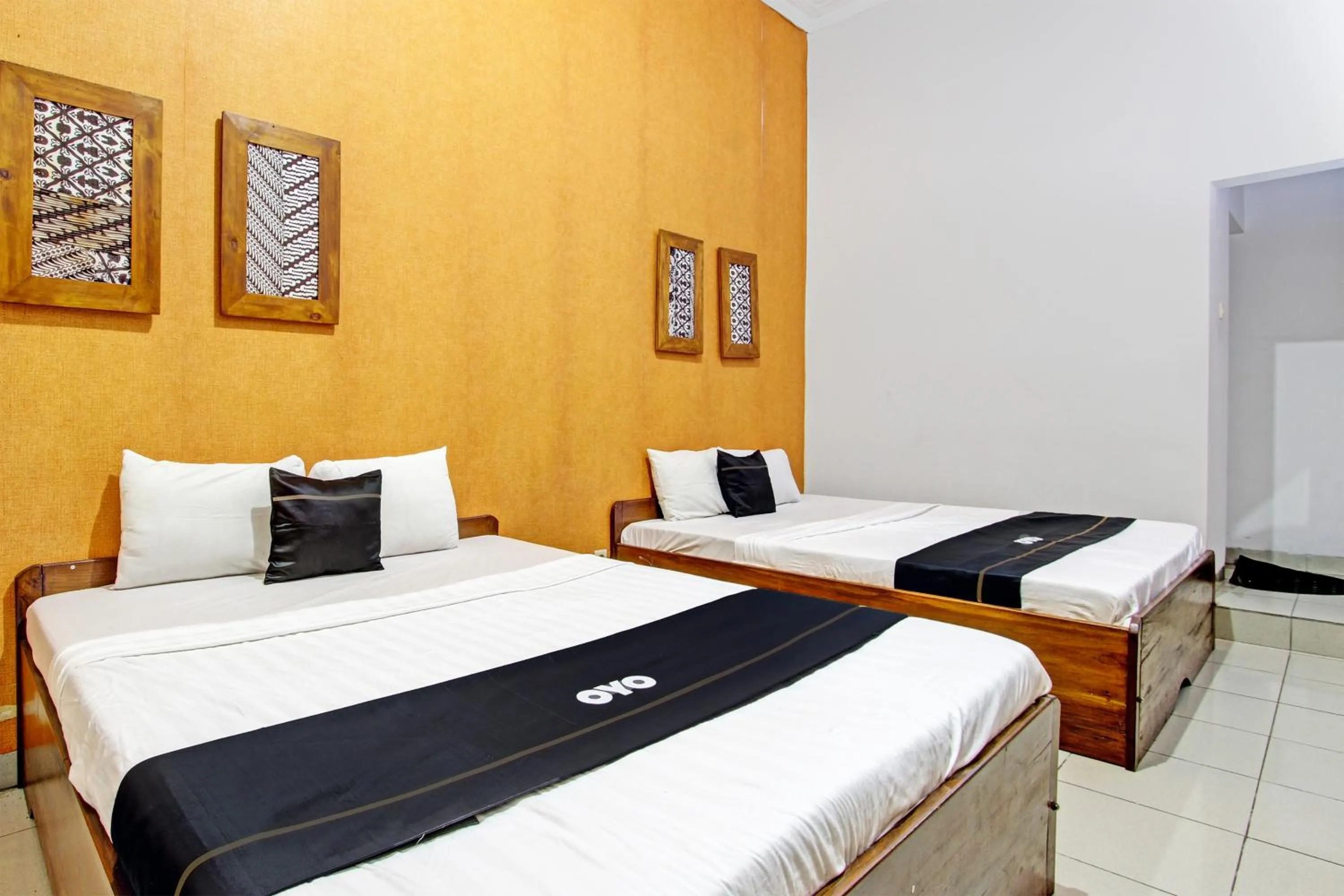 Bedroom in Super OYO Capital O 93240 Candra Dewi Hotel