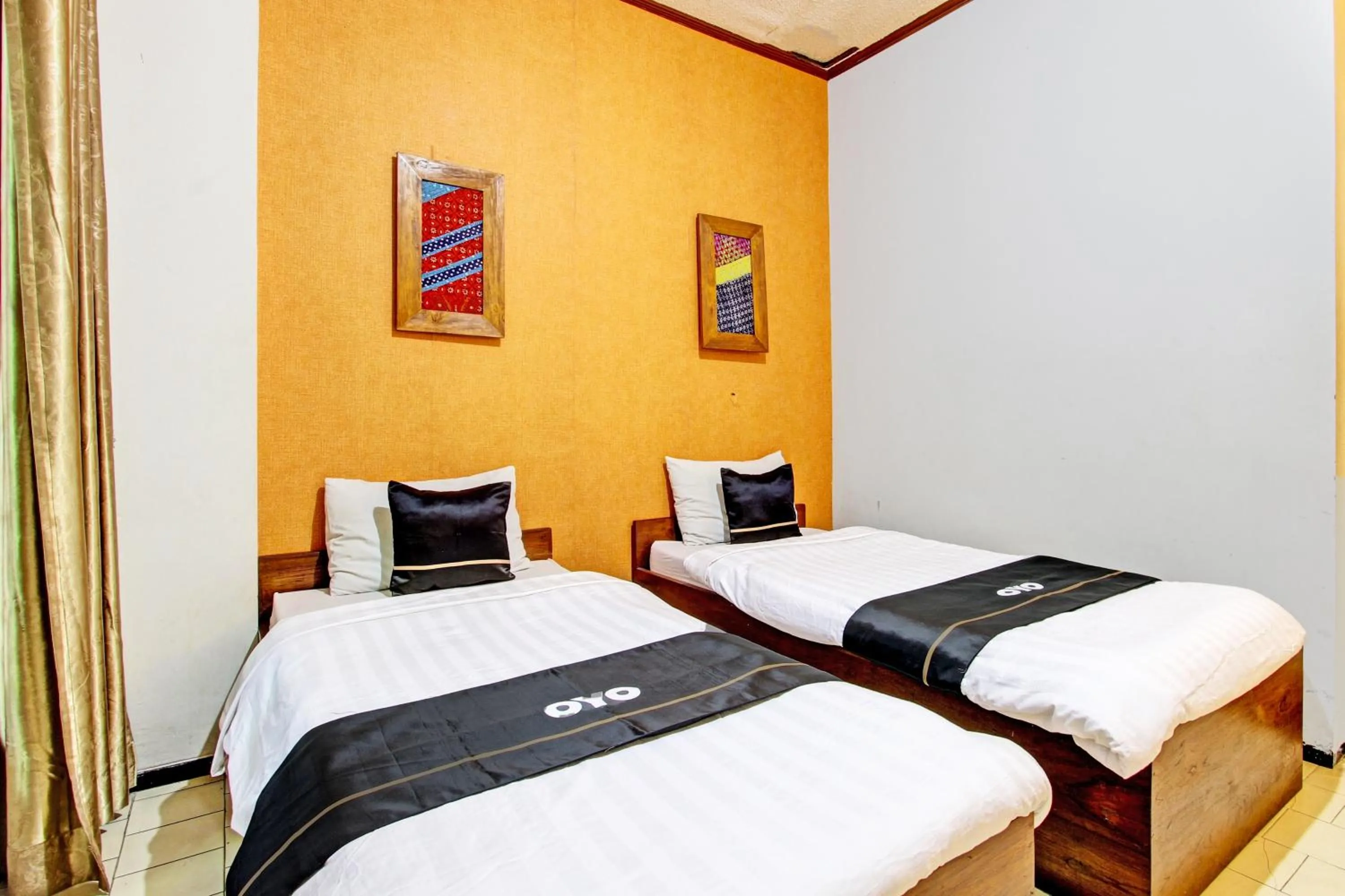 Bedroom in Super OYO Capital O 93240 Candra Dewi Hotel