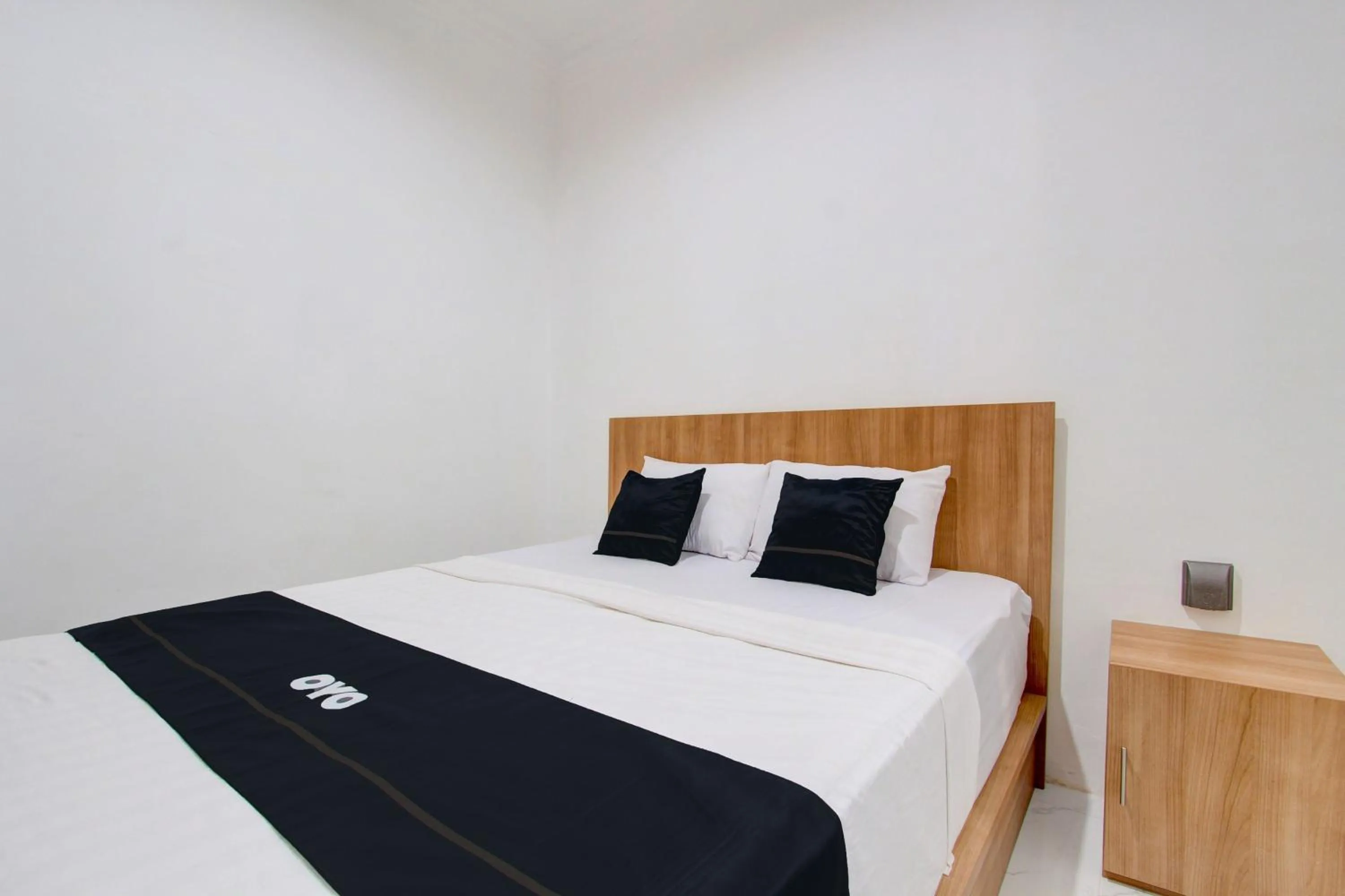 Bedroom in Capital O 93266 Palmier Hotel