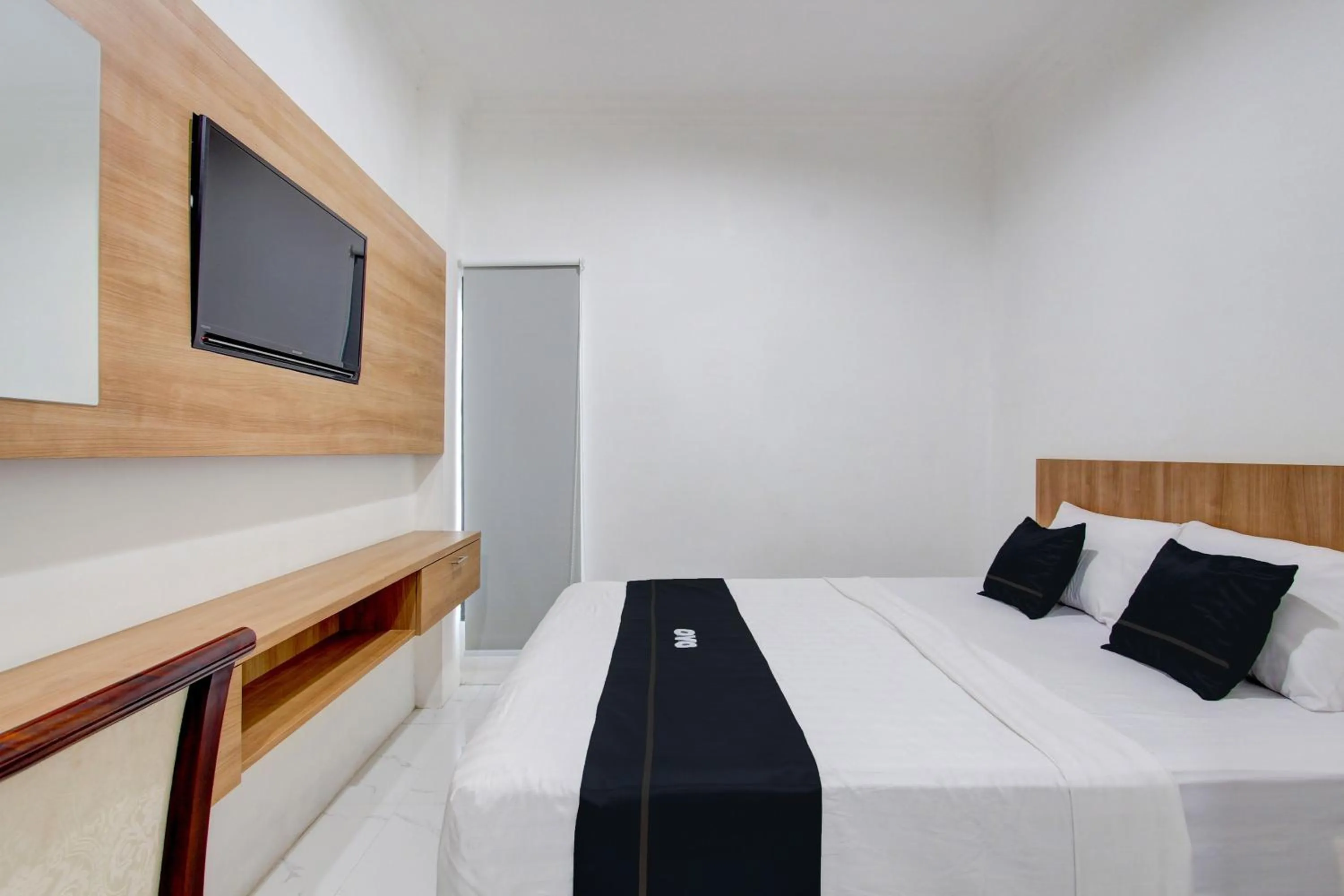 Bedroom in Capital O 93266 Palmier Hotel