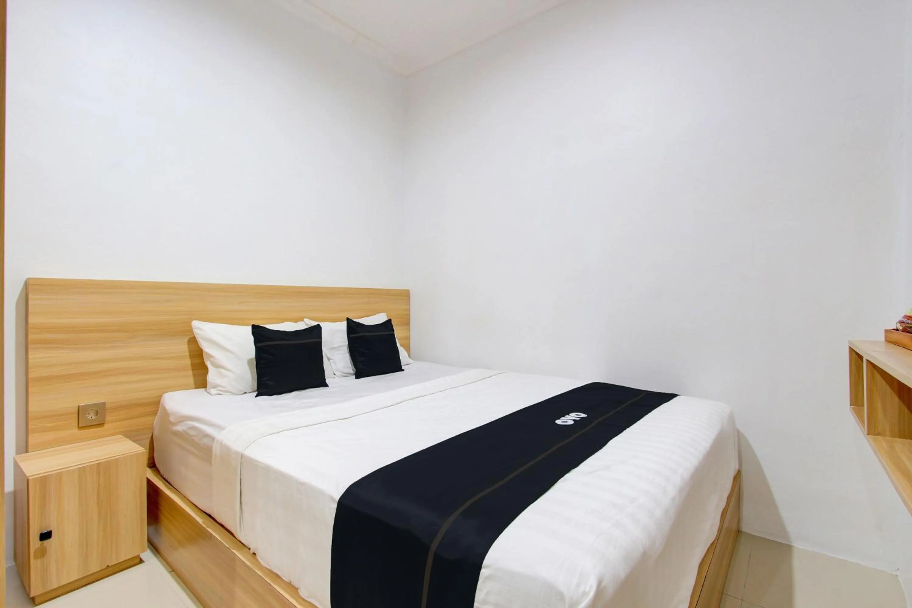 Bedroom in Capital O 93266 Palmier Hotel