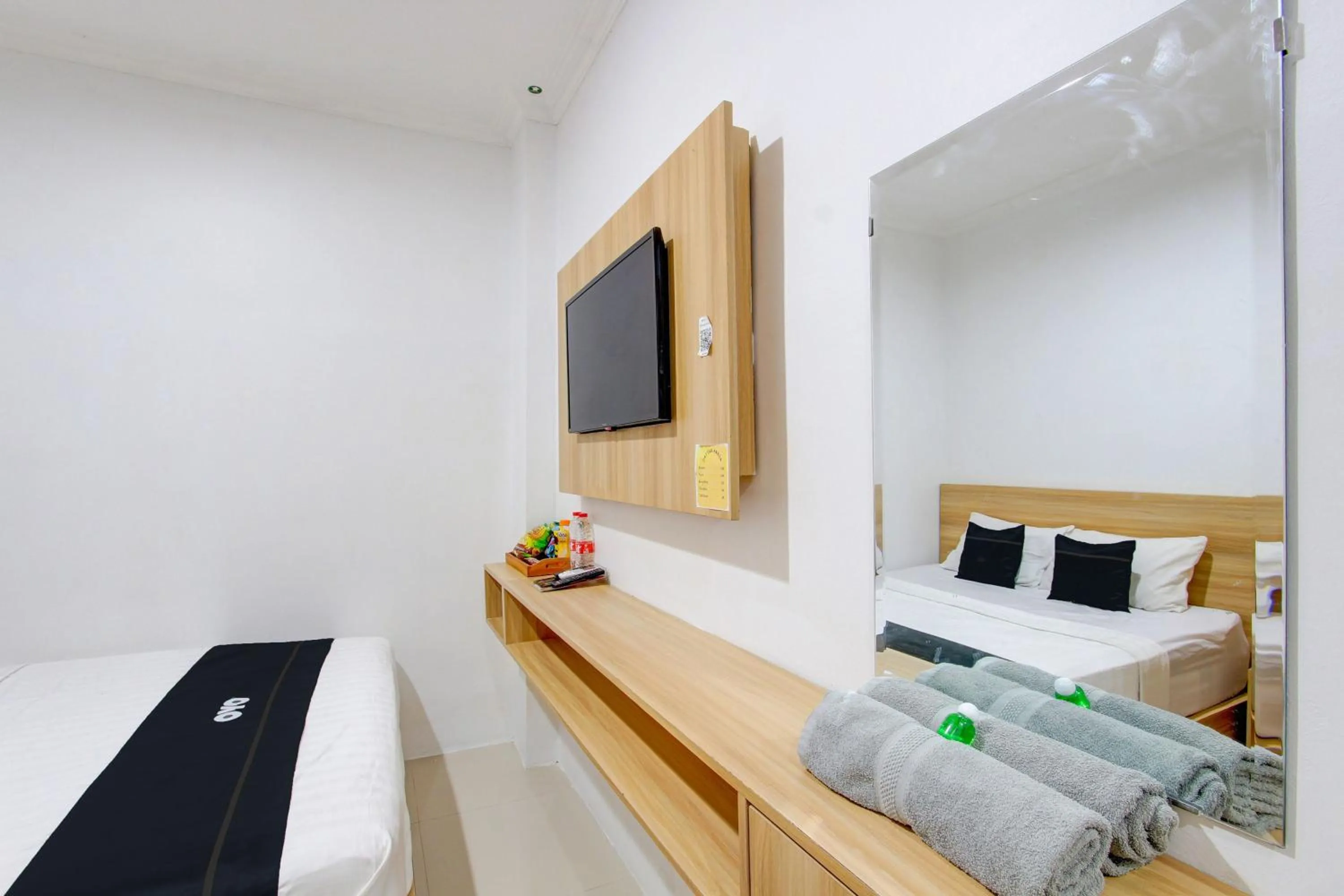 Bedroom in Capital O 93266 Palmier Hotel