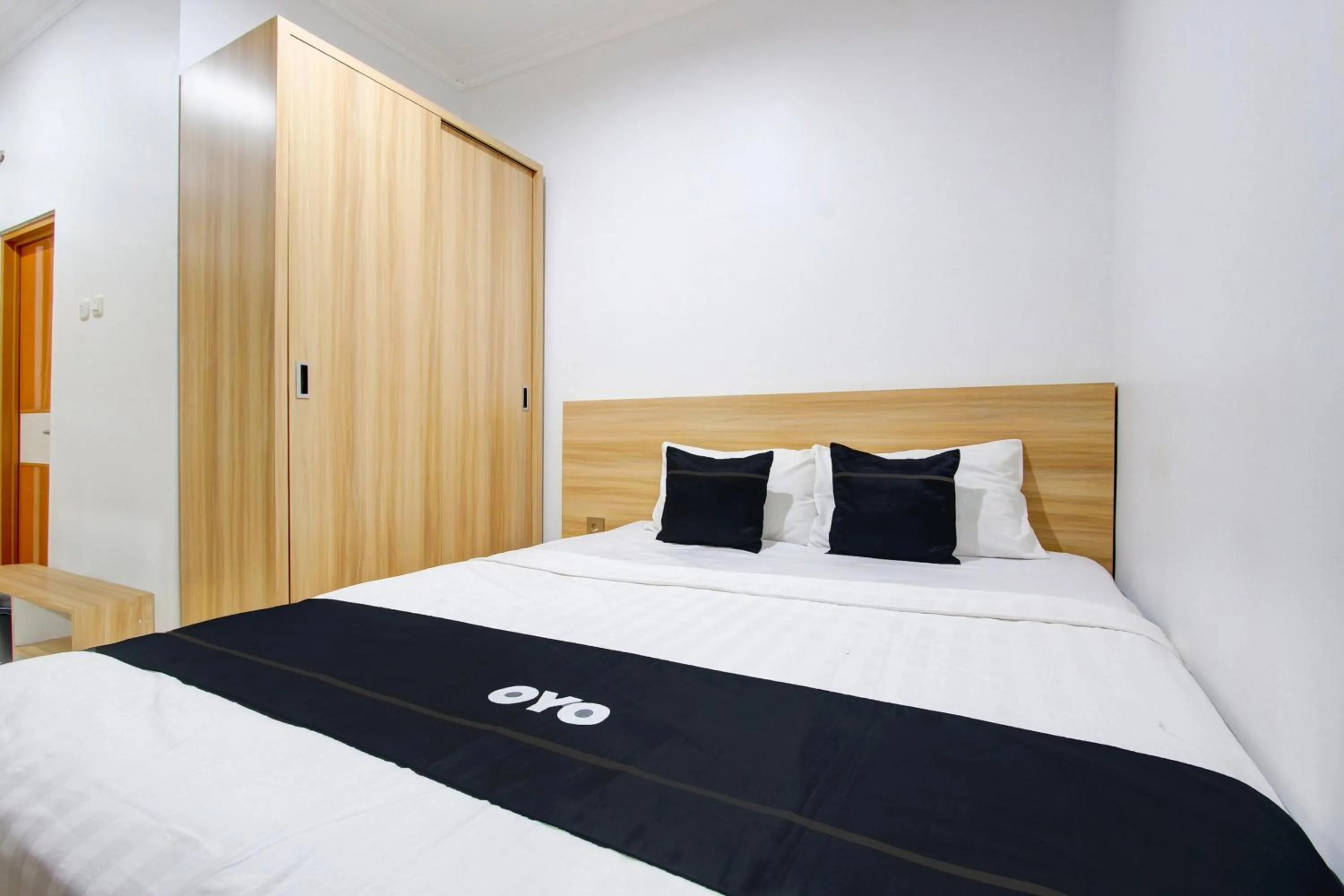 Bedroom in Capital O 93266 Palmier Hotel