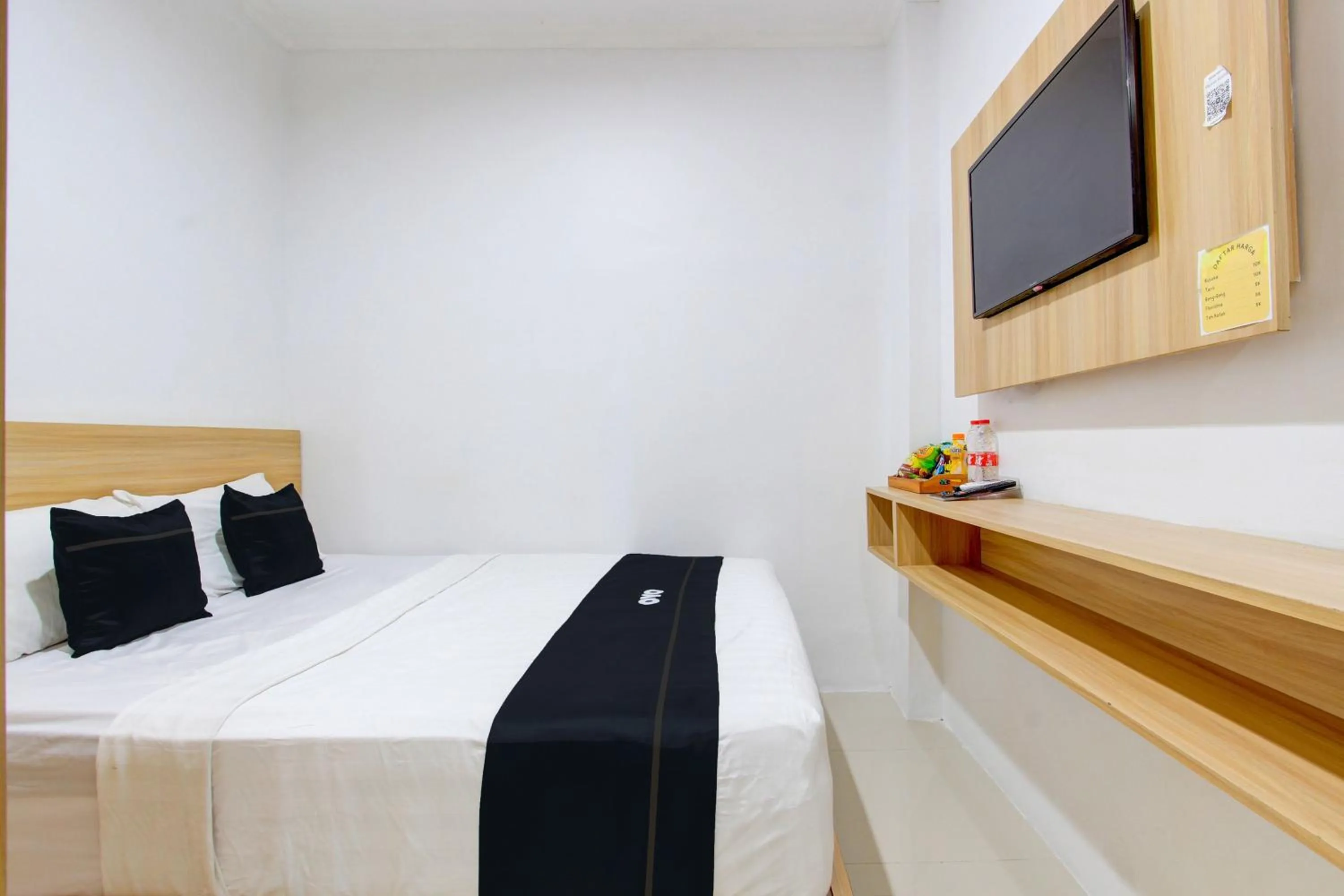 Bedroom in Capital O 93266 Palmier Hotel