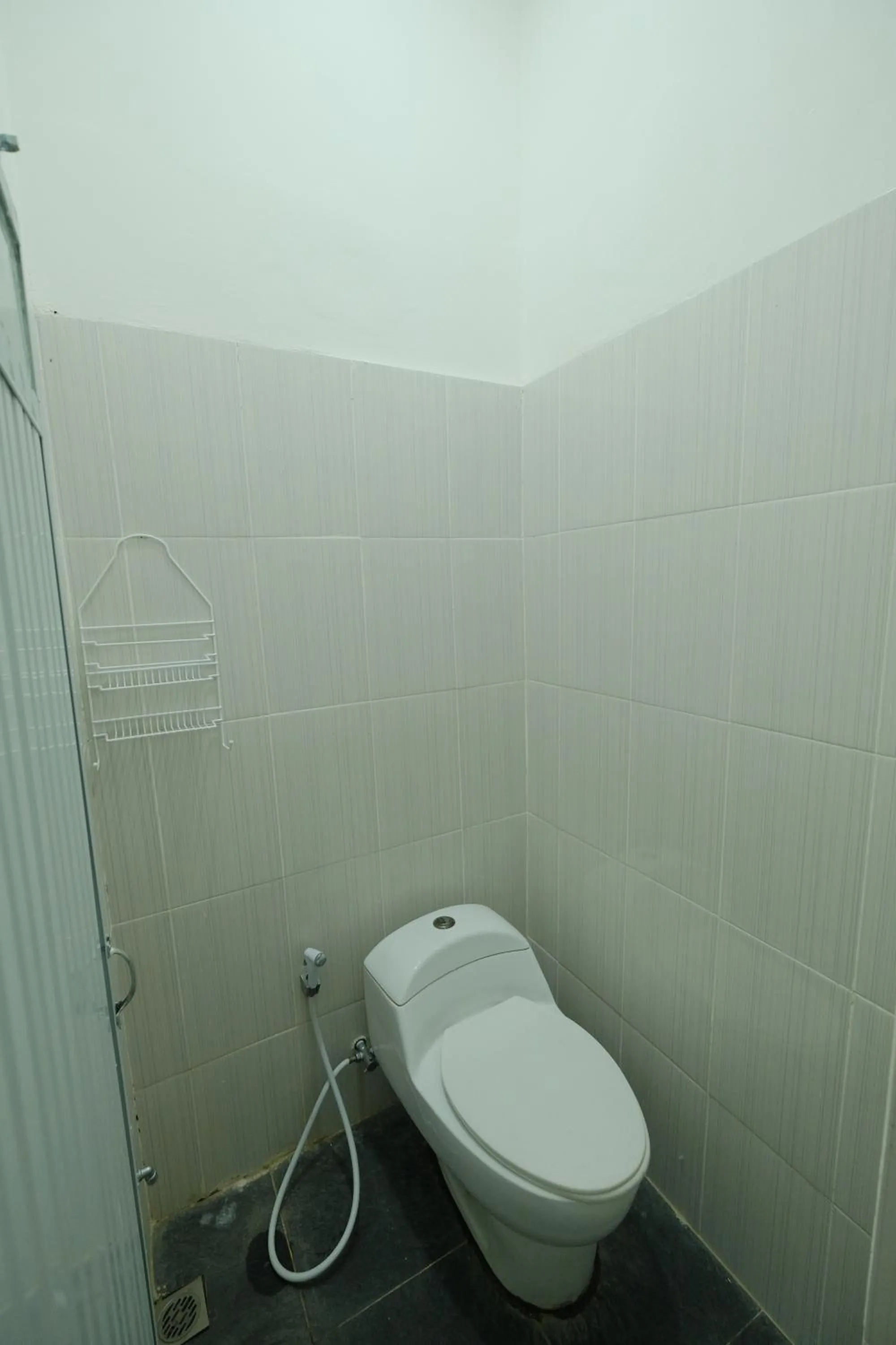 Bathroom in Hotel O Penginapan Permata Hijau Syariah Near Bukit Teletubbies