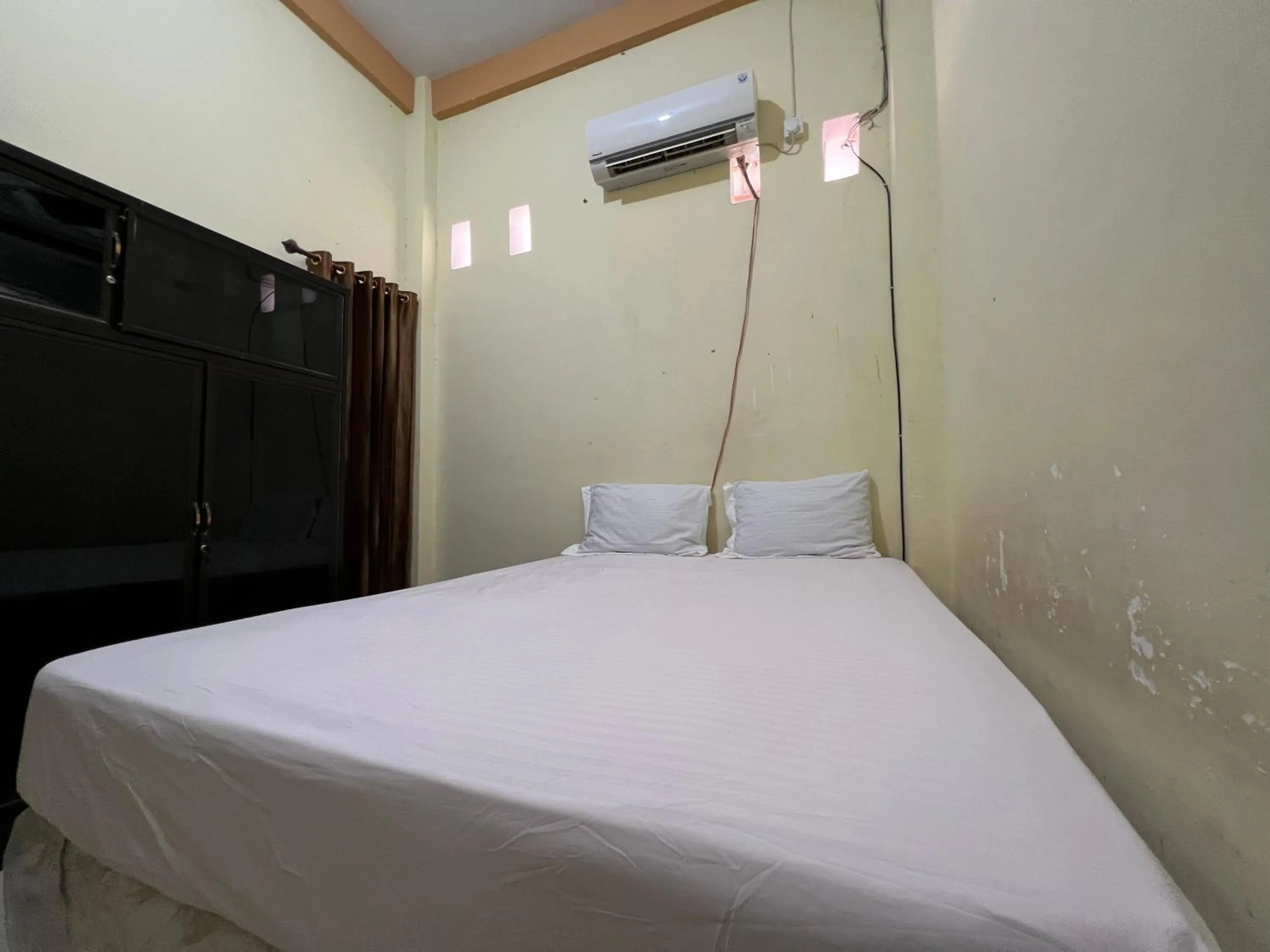 Bedroom, Bed in Hotel O Mely Homestay