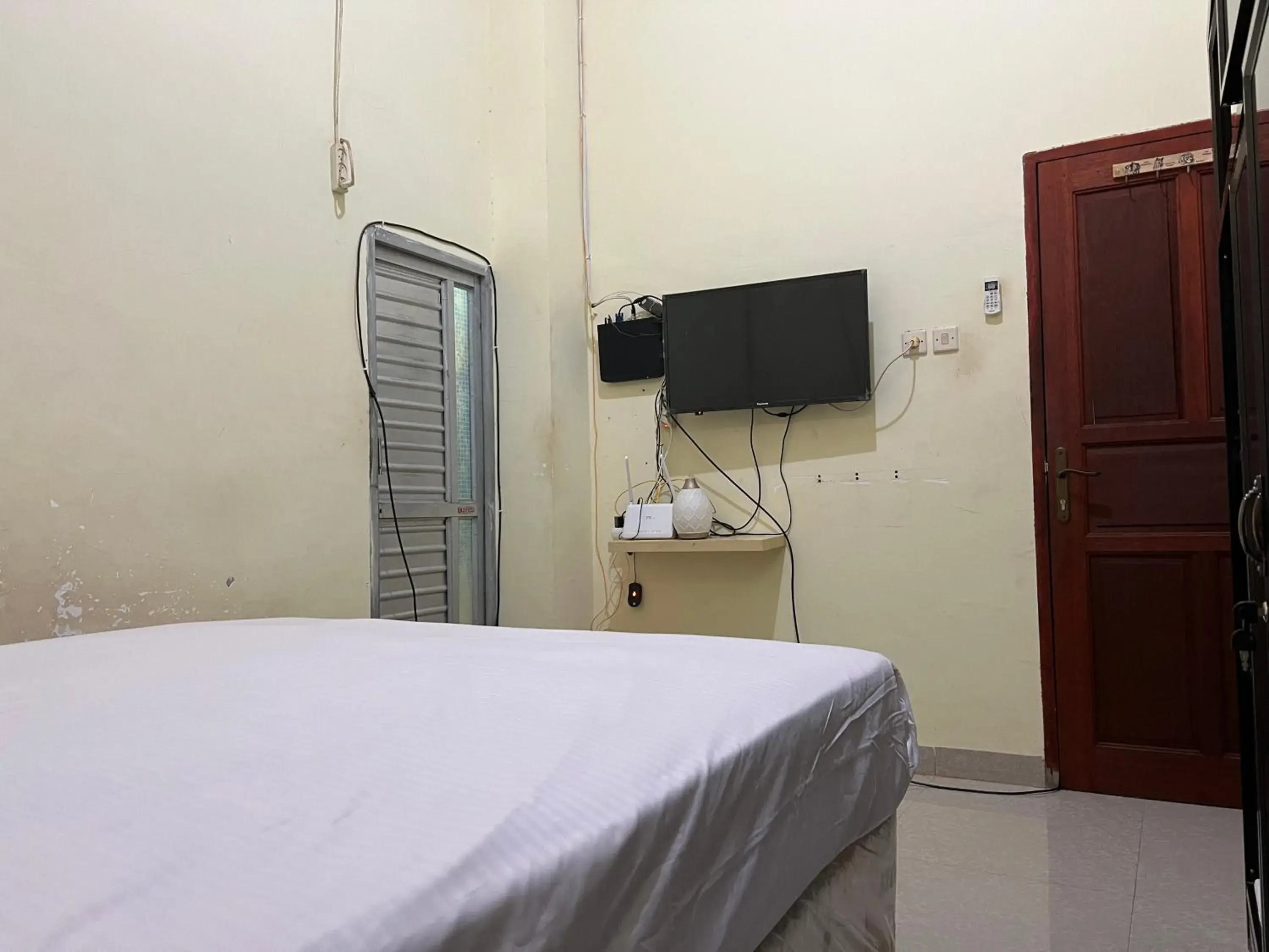 Bedroom, Bed in Hotel O Mely Homestay Bedroom, Bed in Hotel O Mely Homestay