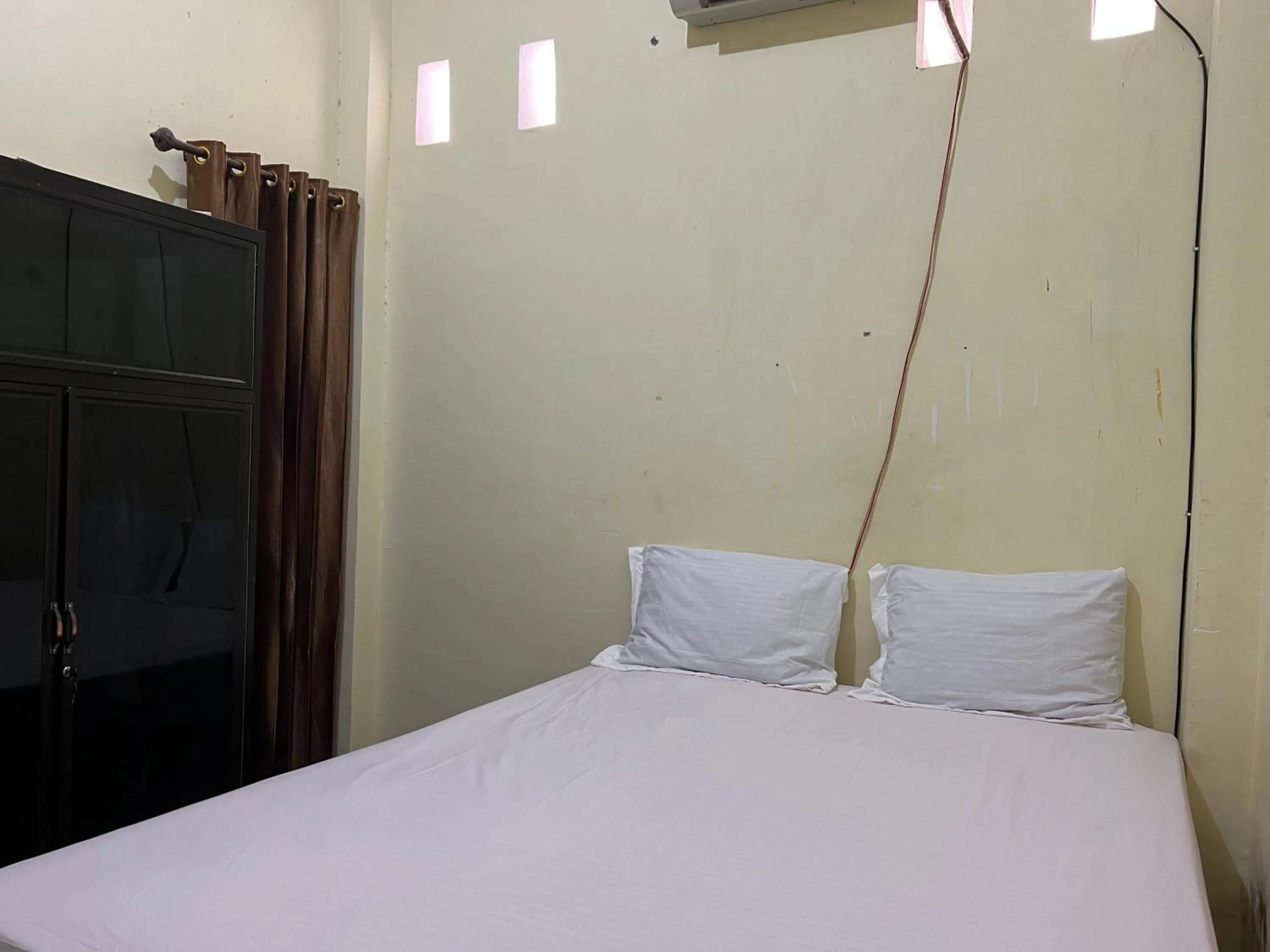 Bedroom, Bed in Hotel O Mely Homestay