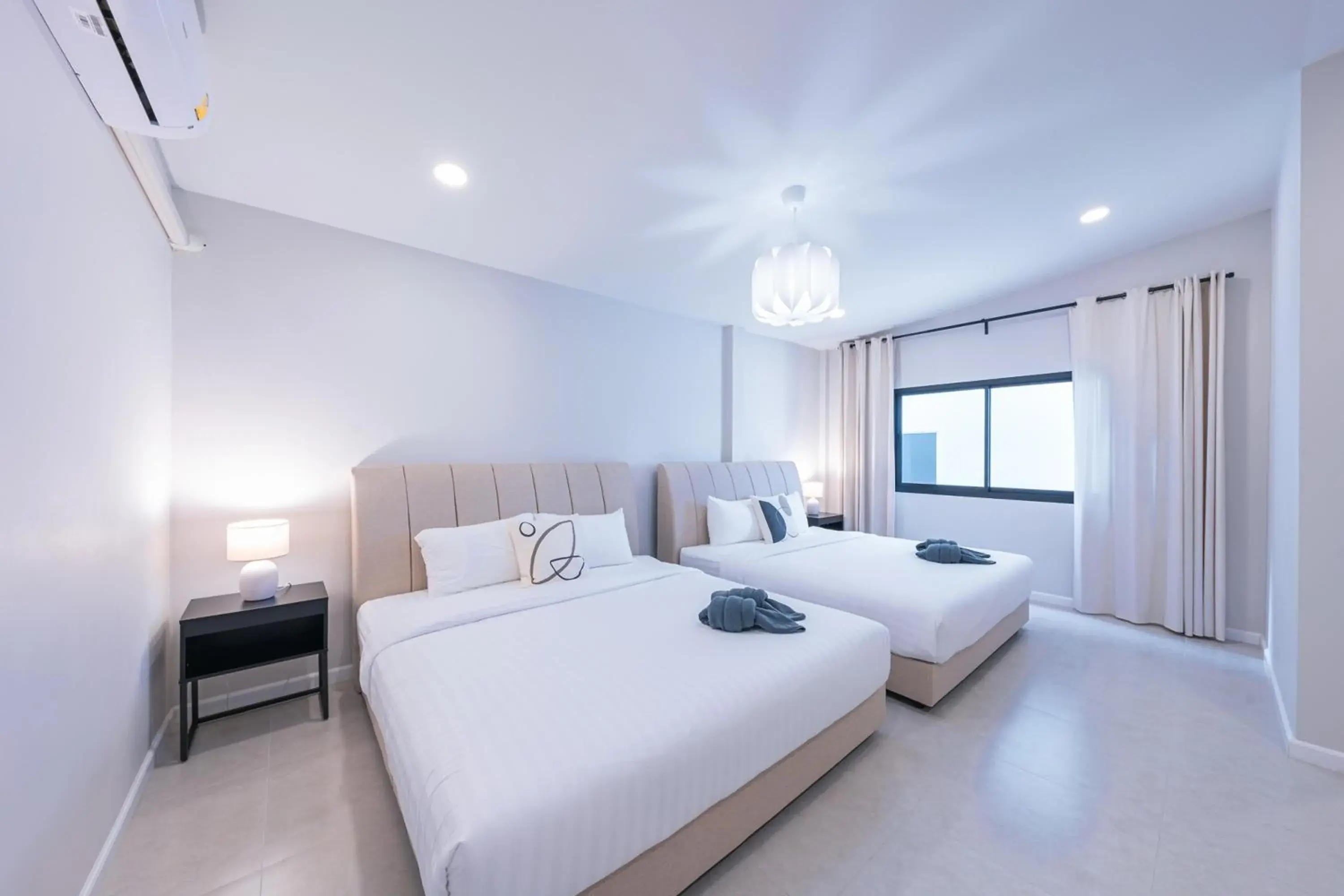 Bed in The 38 Pool Villas Pattaya Bed in The 38 Pool Villas Pattaya