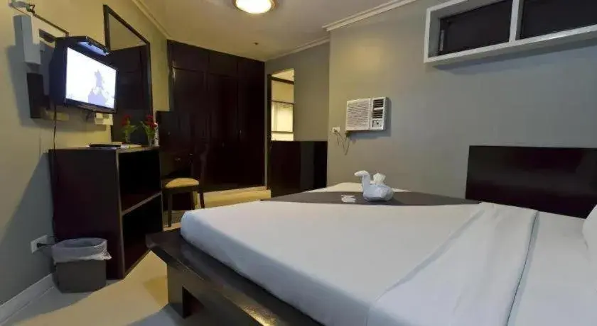 Bed in Richmond Plaza Hotel Bed in Richmond Plaza Hotel