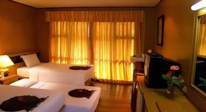 Bed in Phi Phi Banyan Villa Bed in Phi Phi Banyan Villa