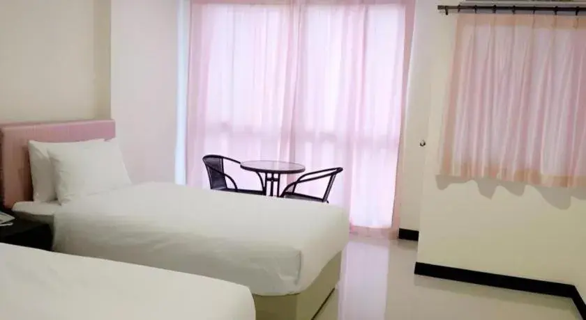 Bed in The Capital Hotel Bed in The Capital Hotel