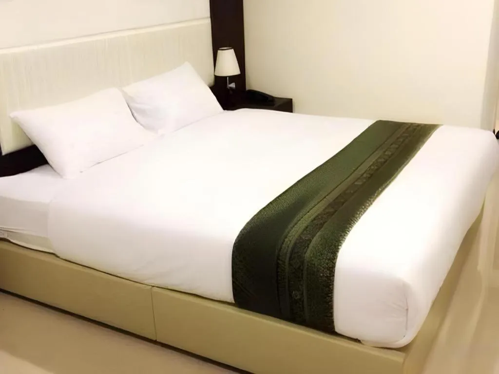 Bed in The Capital Hotel